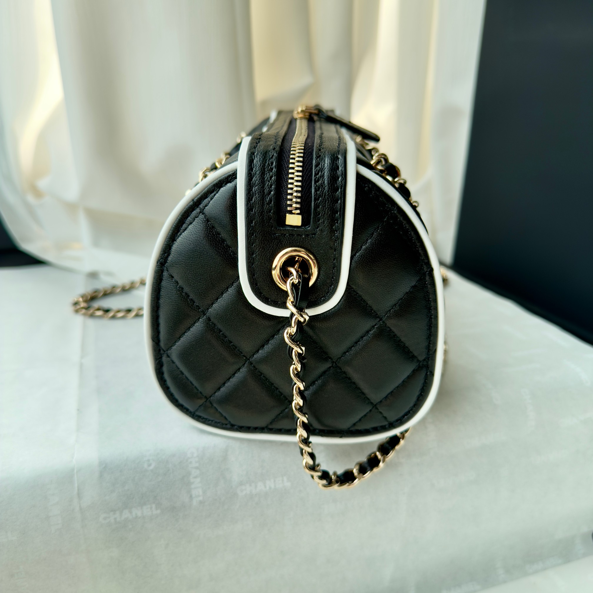 Elegant Chanel Quilted Leather Barrel Bag with Chain Strap 6 a1741512612954 7658
