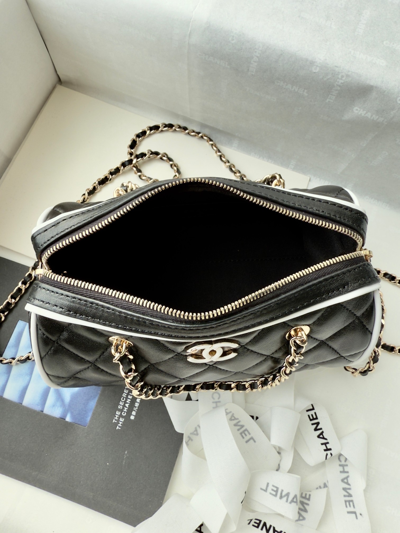 Elegant Chanel Quilted Leather Barrel Bag with Chain Strap 8 a1741512614371 4850