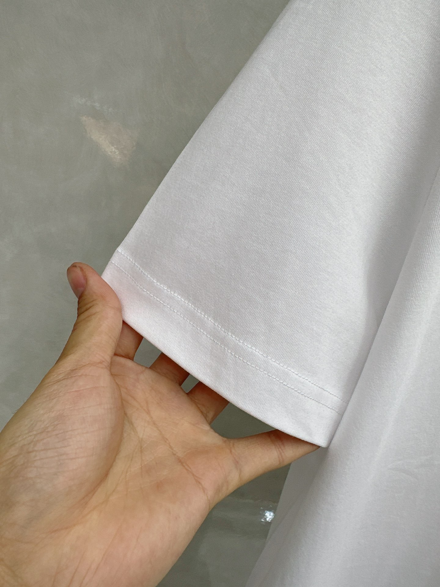 杰尼亚 2026顶级品质logo刺绣衬衫领棉质短袖T恤，三标齐全，原版定制logo刻字纽扣，定织顶级22