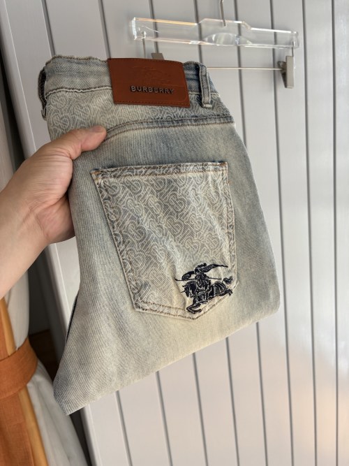 Burberry Distressed Denim Jeans with Embroidered Knight Logo 1 Burberry Distressed Denim Jeans with Embroidered Knight Logo