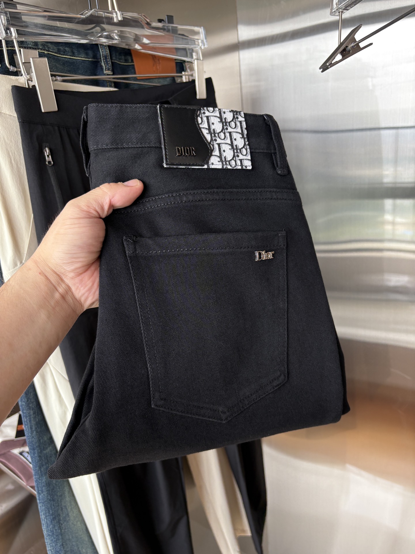 “Custom Water-Washed Jeans: Classy Design with Top-Level Embroidery and Hardware”