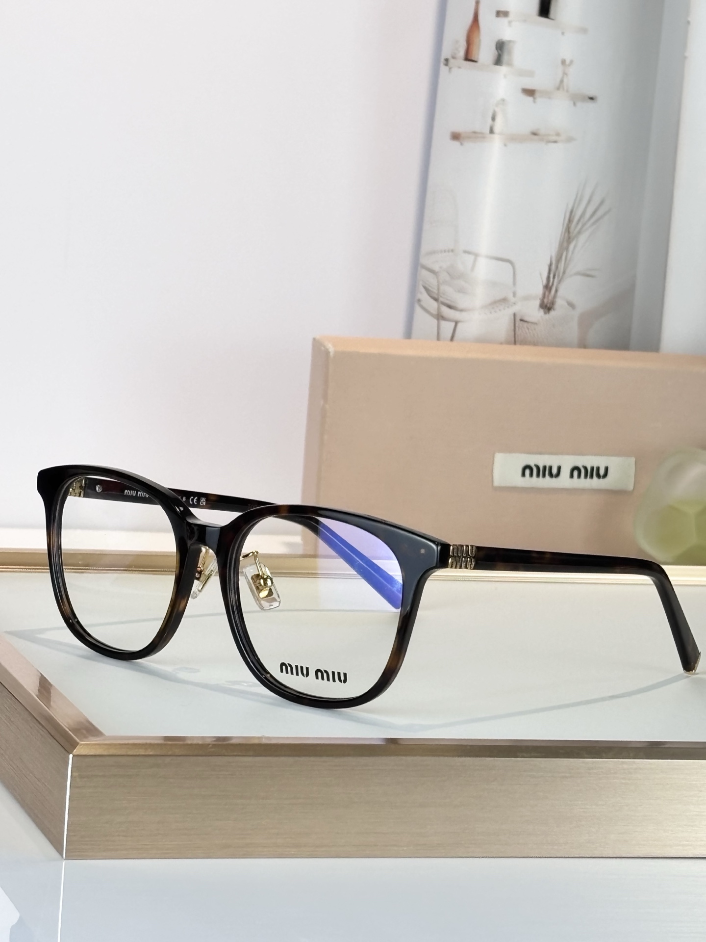 Miumiu*Mod:VMU01WSIZE:54-19-140Farm