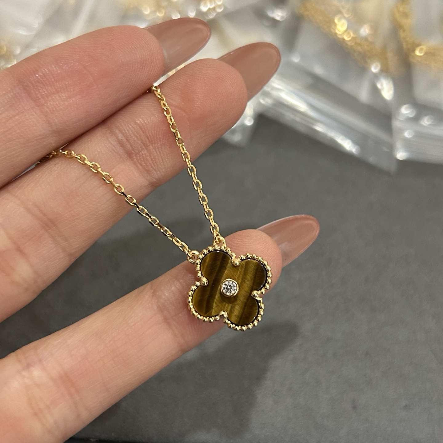 The VCA Four Leaf Diamond Tiger Eye Necklace has arrived - Jewelry