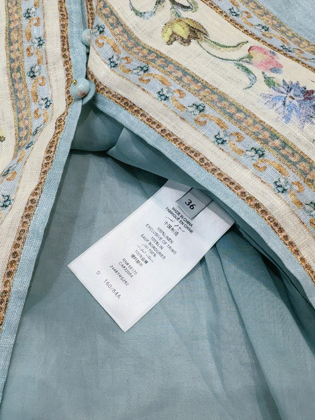 ZIMMERM*A*N*N 深V领长袖中长款连衣裙👗新品推荐🆕❤️……选用亚麻面料制成，采用深V领口，灯