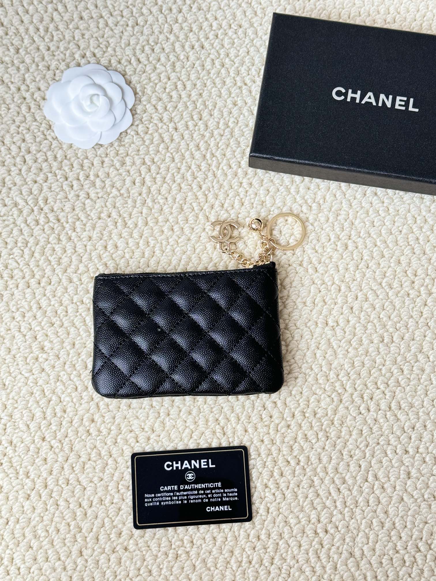 Chanel Classic Quilted Caviar Zip Key Pouch pendant Black grained caviar leather with gold-tone metal hardware 12cm x 8cm