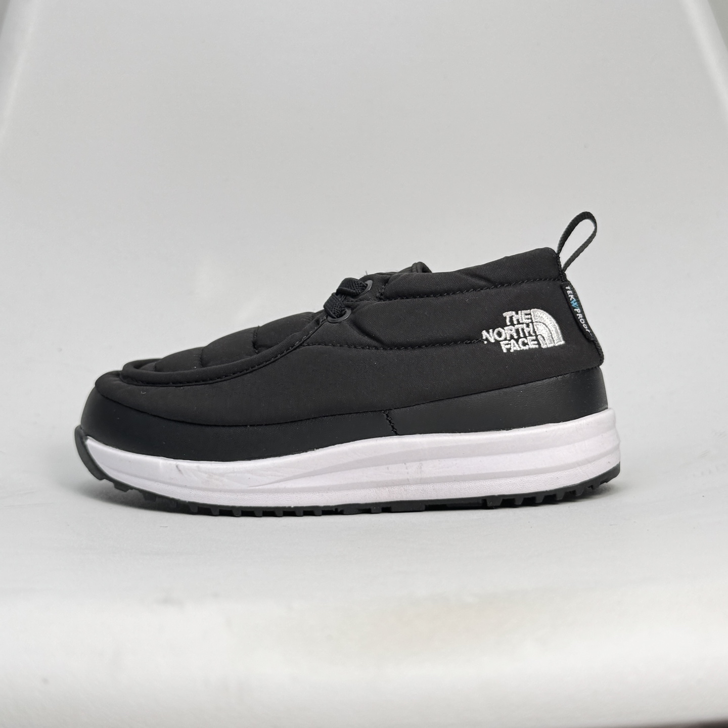 北家新款882松紧带儿童棉鞋 尺码：28-35码 经典北面棉鞋❄️ 松紧带设计，穿脱方便✌🏻 优质面料拼接，保暖又舒适☁️ 原装耐磨防滑大底，脚感超赞👍🏻-选品中心