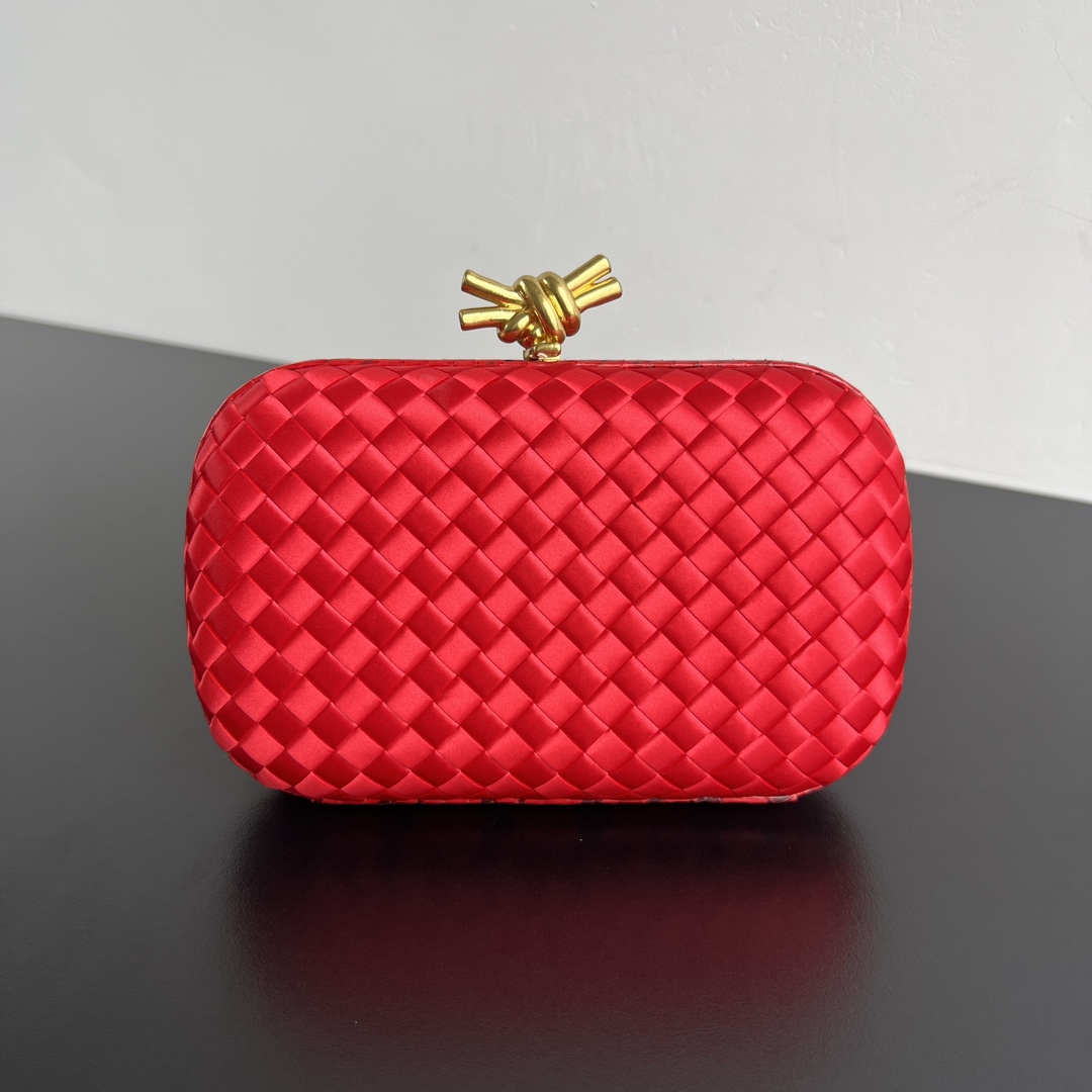 Knot woven evening bag snakeskin trim knot clasp