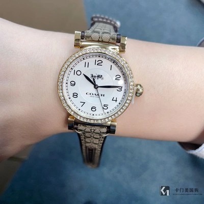 Luxury Cartier-like 32mm gold watch with valose crystal, perfect for special occasions.