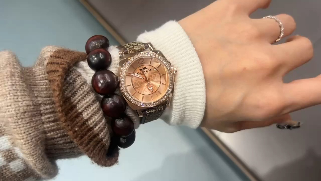Coach Women's Elegant Rose Gold-Tone Monogram Leather Strap Watch