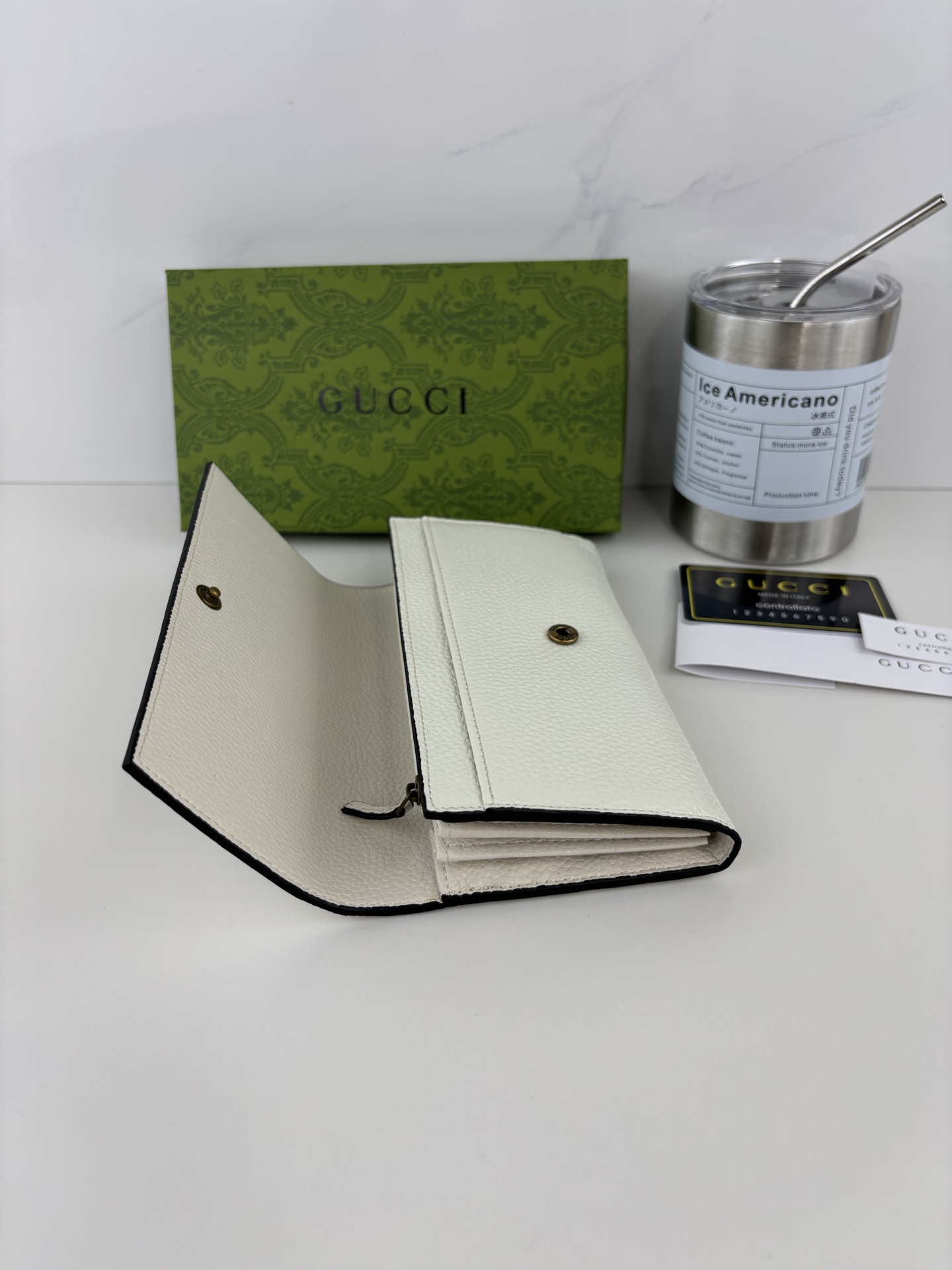 GUCCI 蟒蛇皮蝴蝶結財布 - 双Gデザインと上質な小牛皮