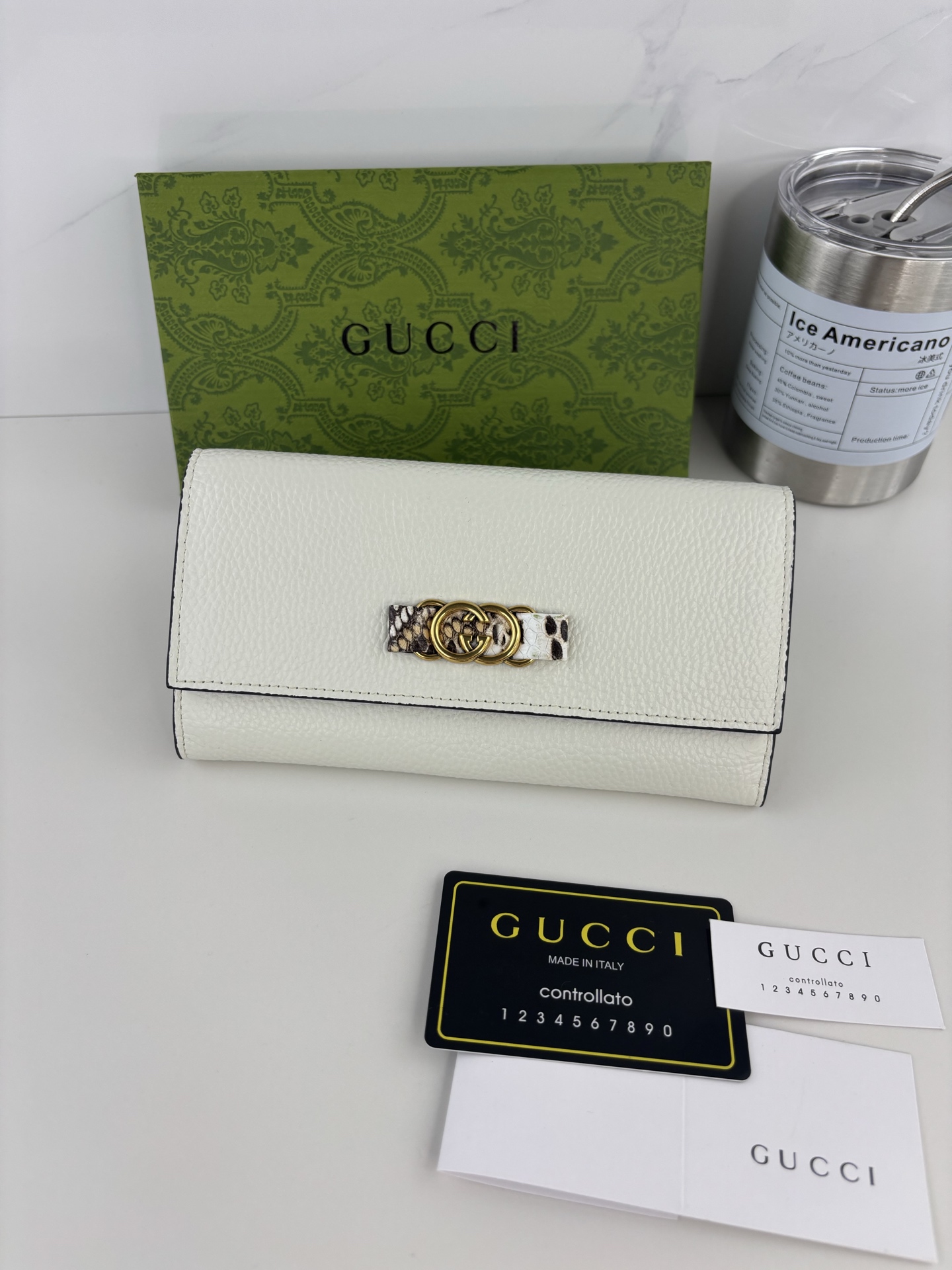 GUCCI 蟒蛇皮蝴蝶結財布 - 双Gデザインと上質な小牛皮