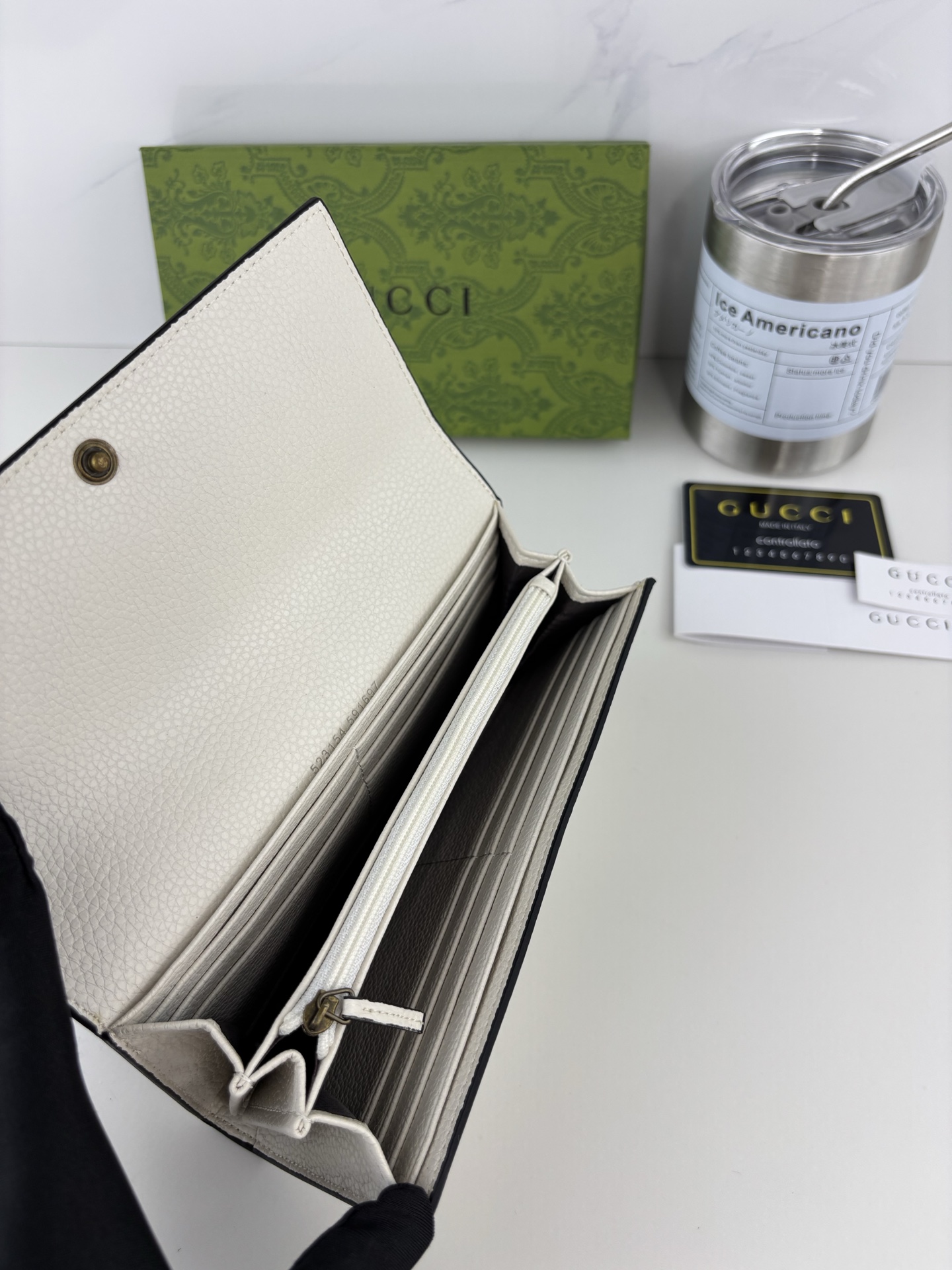 GUCCI 蟒蛇皮蝴蝶結財布 - 双Gデザインと上質な小牛皮