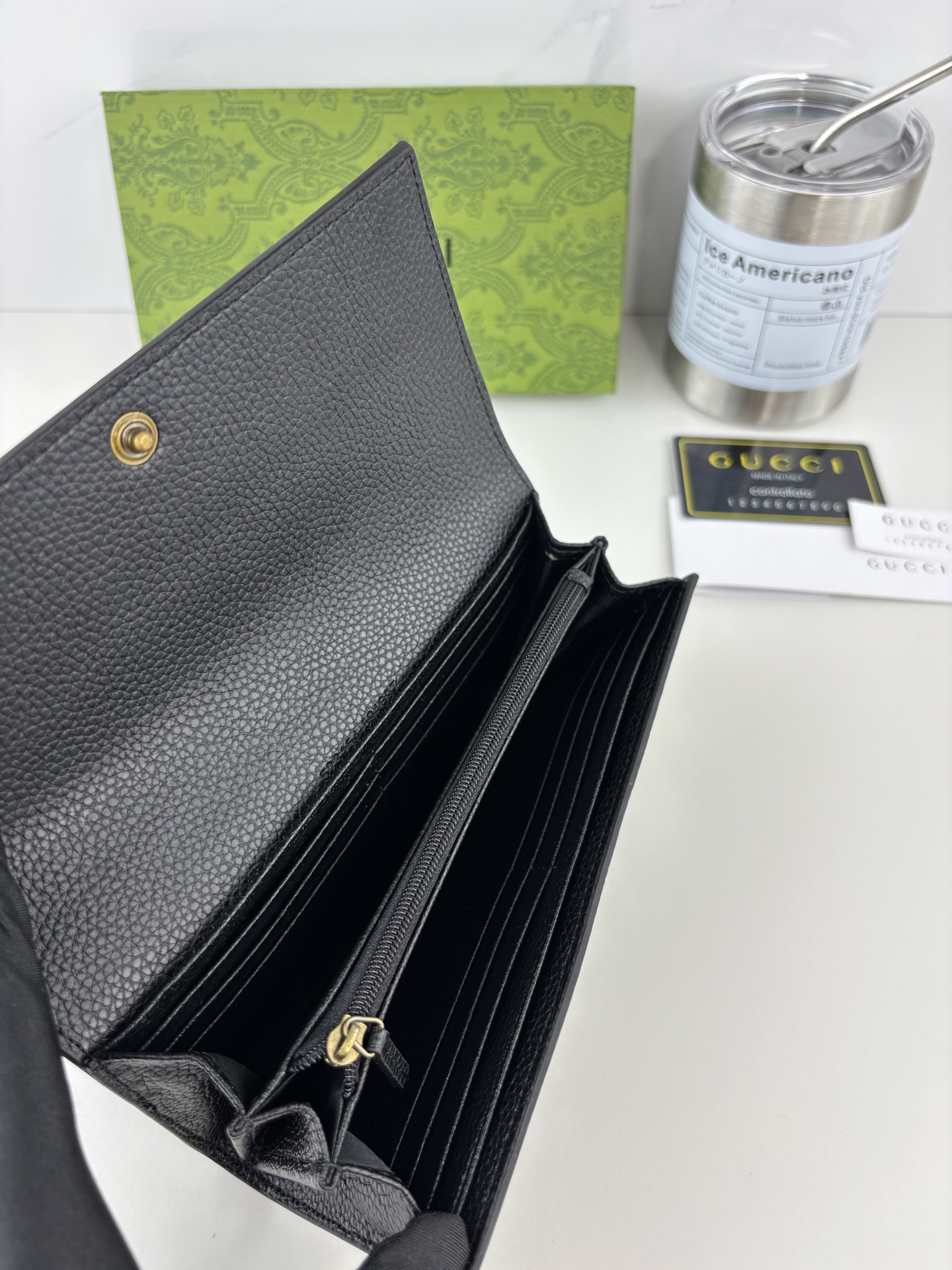 GUCCI 蟒蛇皮蝴蝶結財布 - 小牛皮製のラグジュアリーアイテム