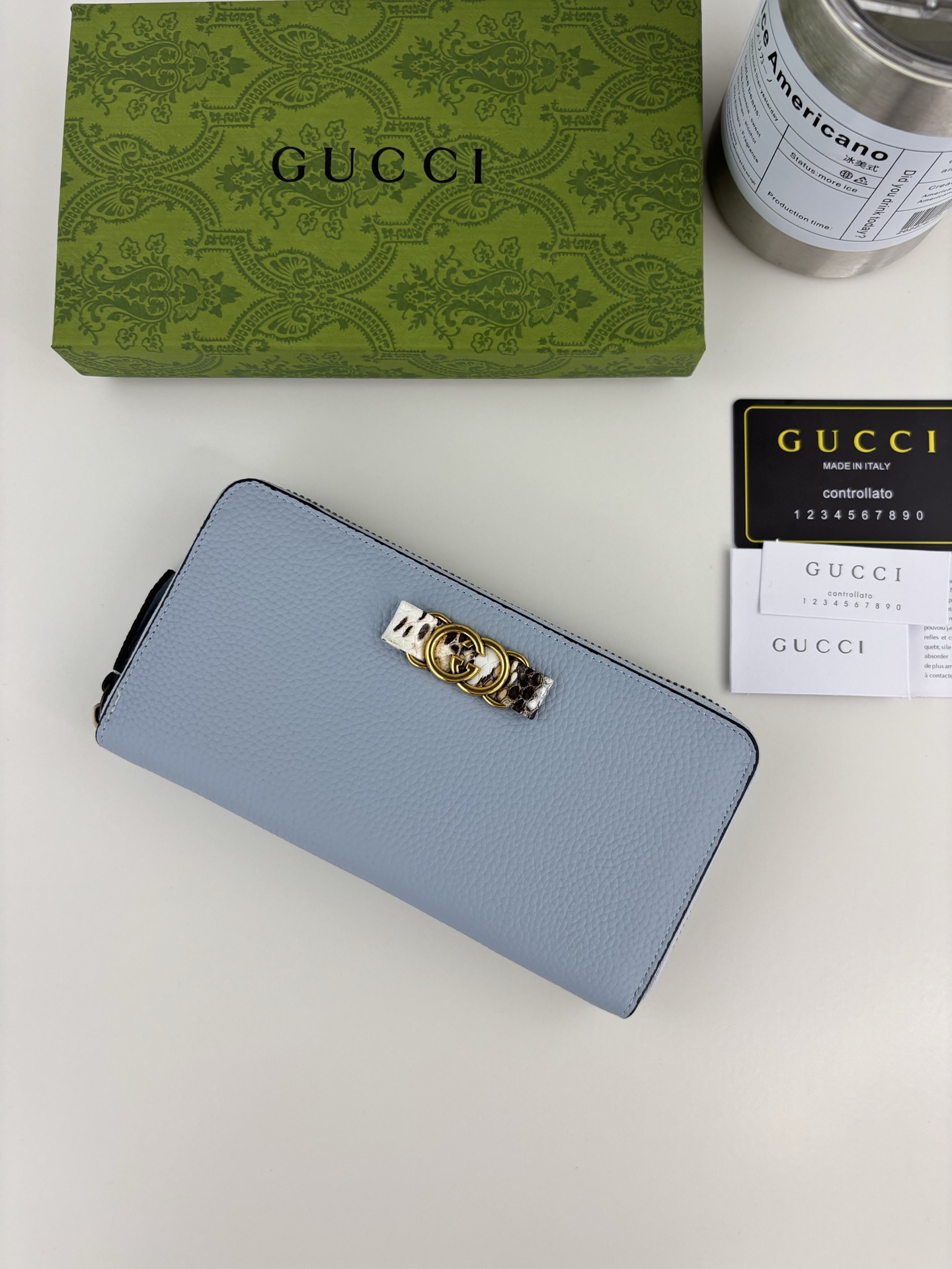 GUCCI 蟒蛇皮蝴蝶結財布 - 双Gデザインと小牛皮使用