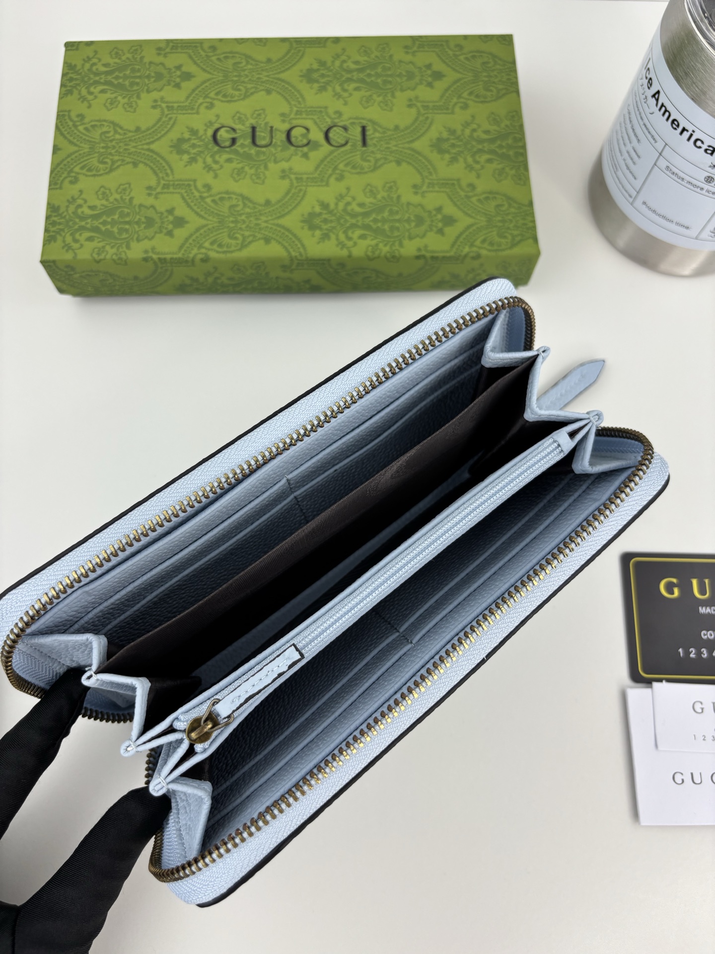 GUCCI 蟒蛇皮蝴蝶結財布 - 双Gデザインと小牛皮使用