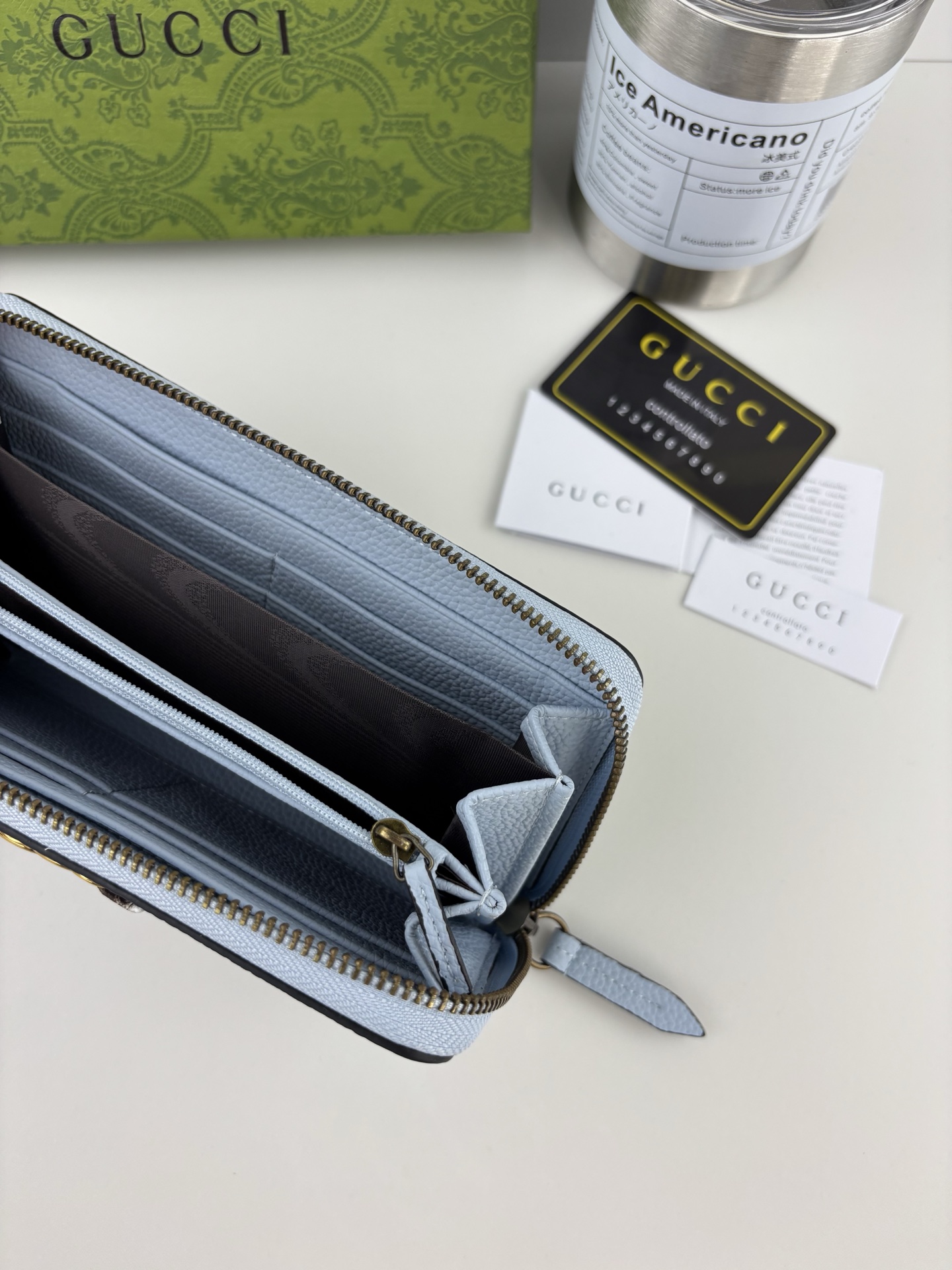 GUCCI 蟒蛇皮蝴蝶結財布 - 双Gデザインと小牛皮使用