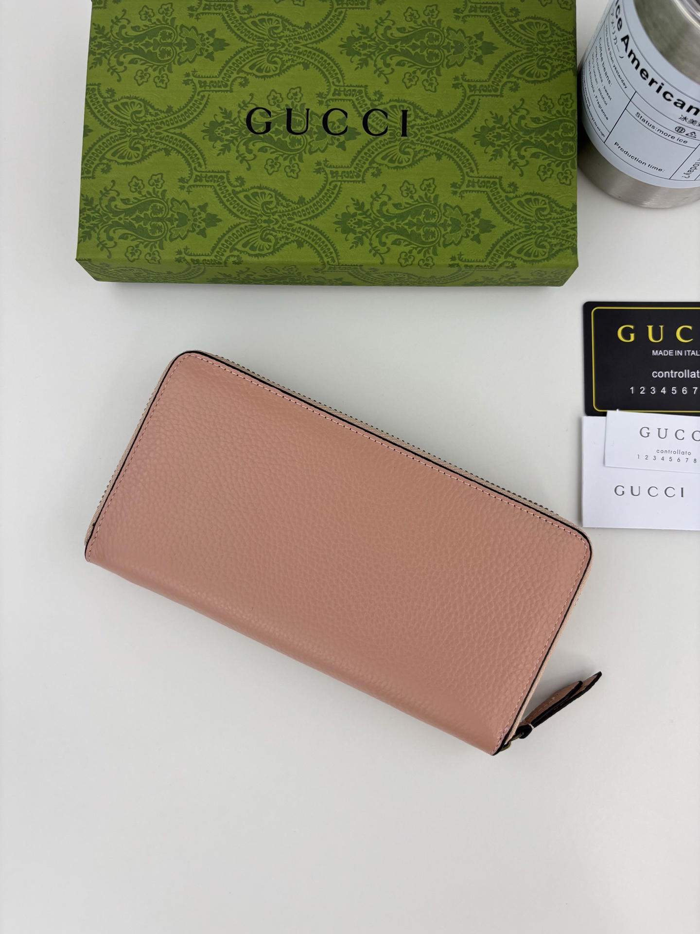 GUCCI 蟒蛇皮蝴蝶結財布 - 双Gデザインとラグジュアリーな素材