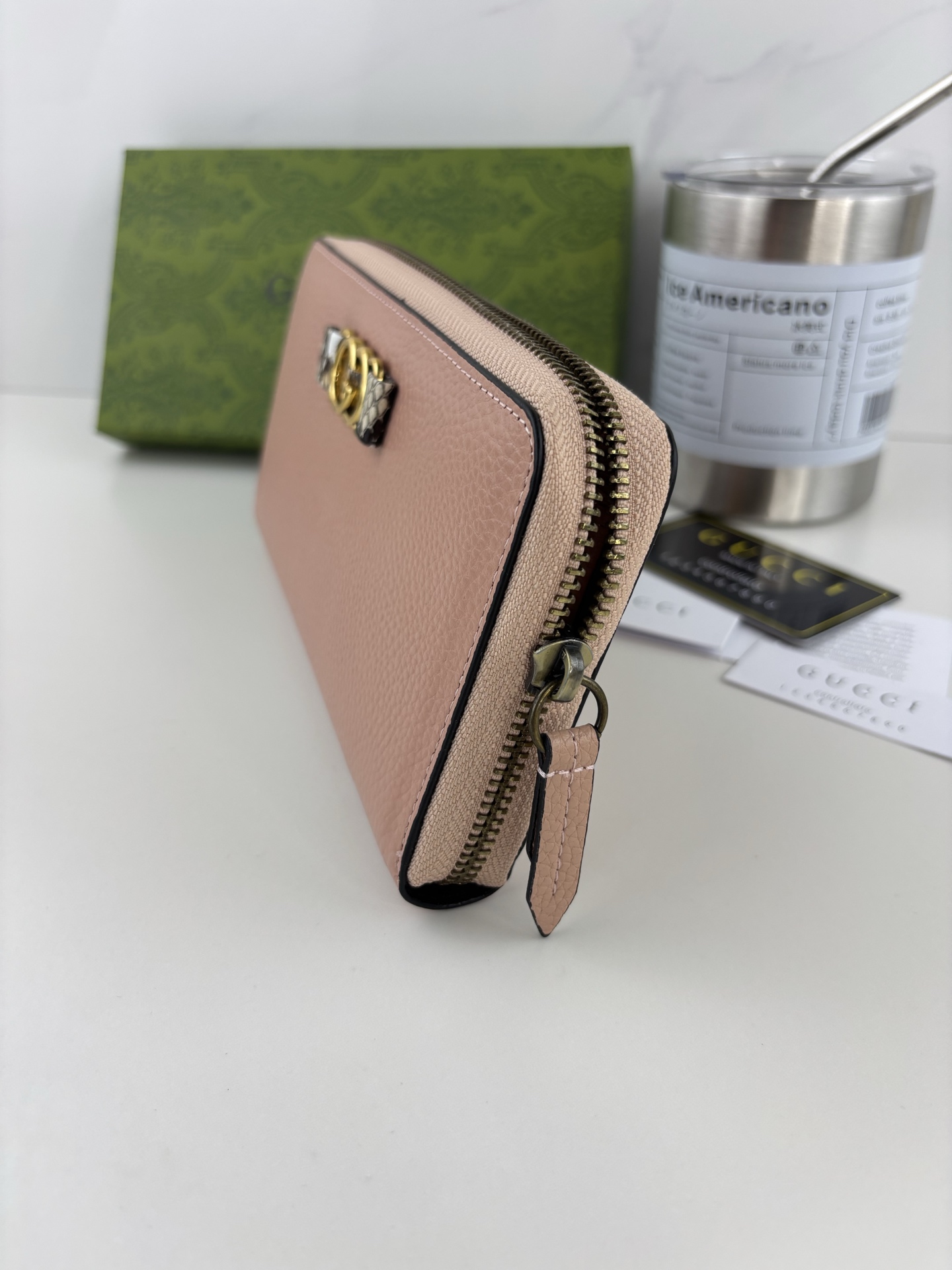 GUCCI 蟒蛇皮蝴蝶結財布 - 双Gデザインとラグジュアリーな素材