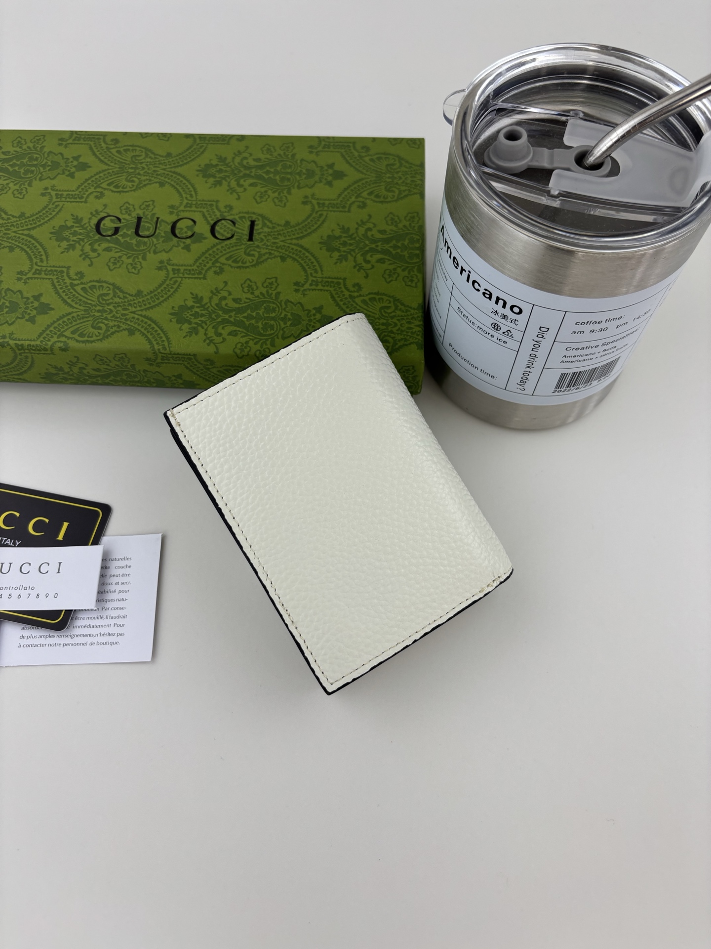 GUCCl 蟒蛇皮蝴蝶结小財布 - 小牛皮製・双Gロゴ付き