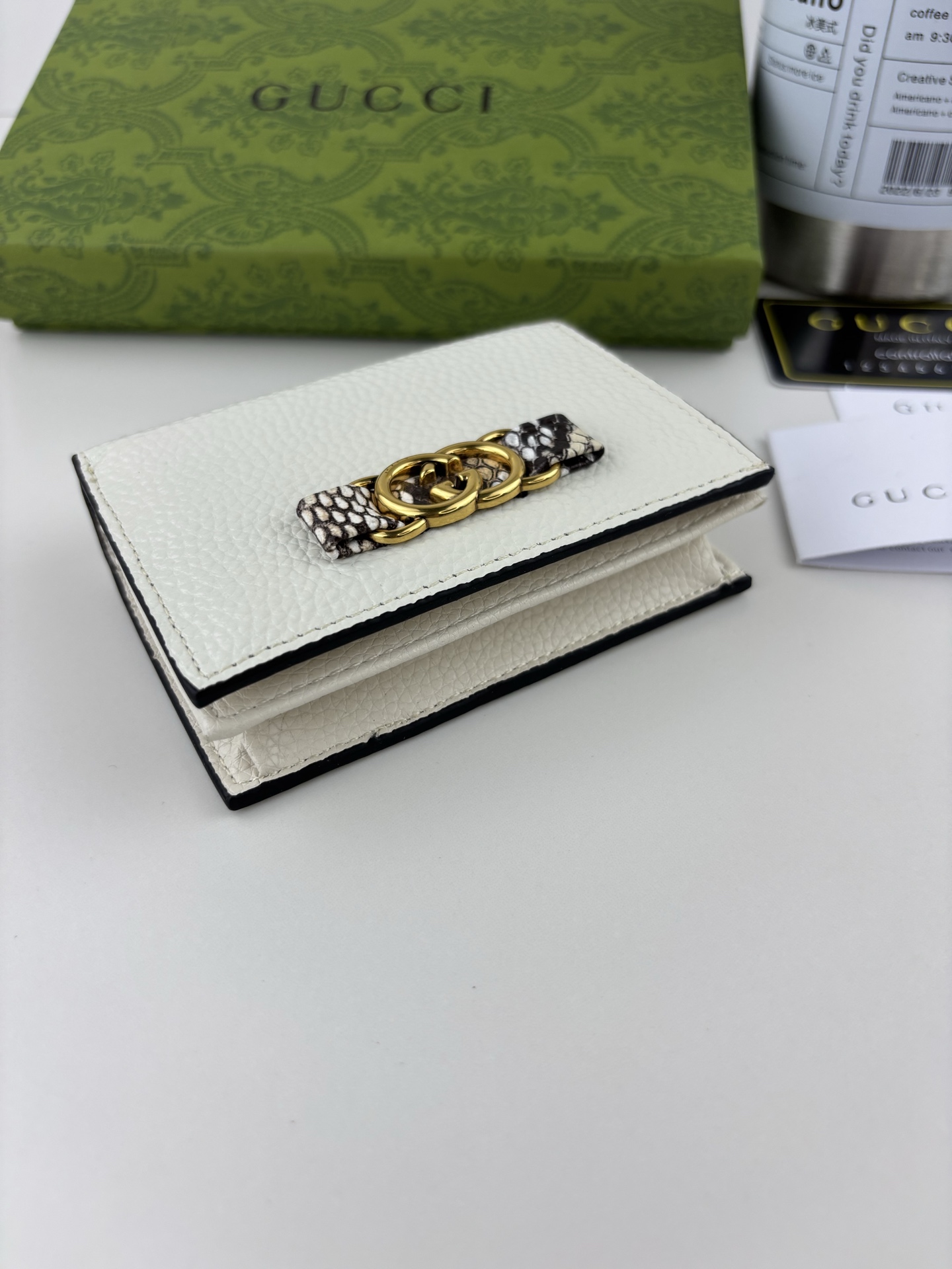 GUCCl 蟒蛇皮蝴蝶结小財布 - 小牛皮製・双Gロゴ付き