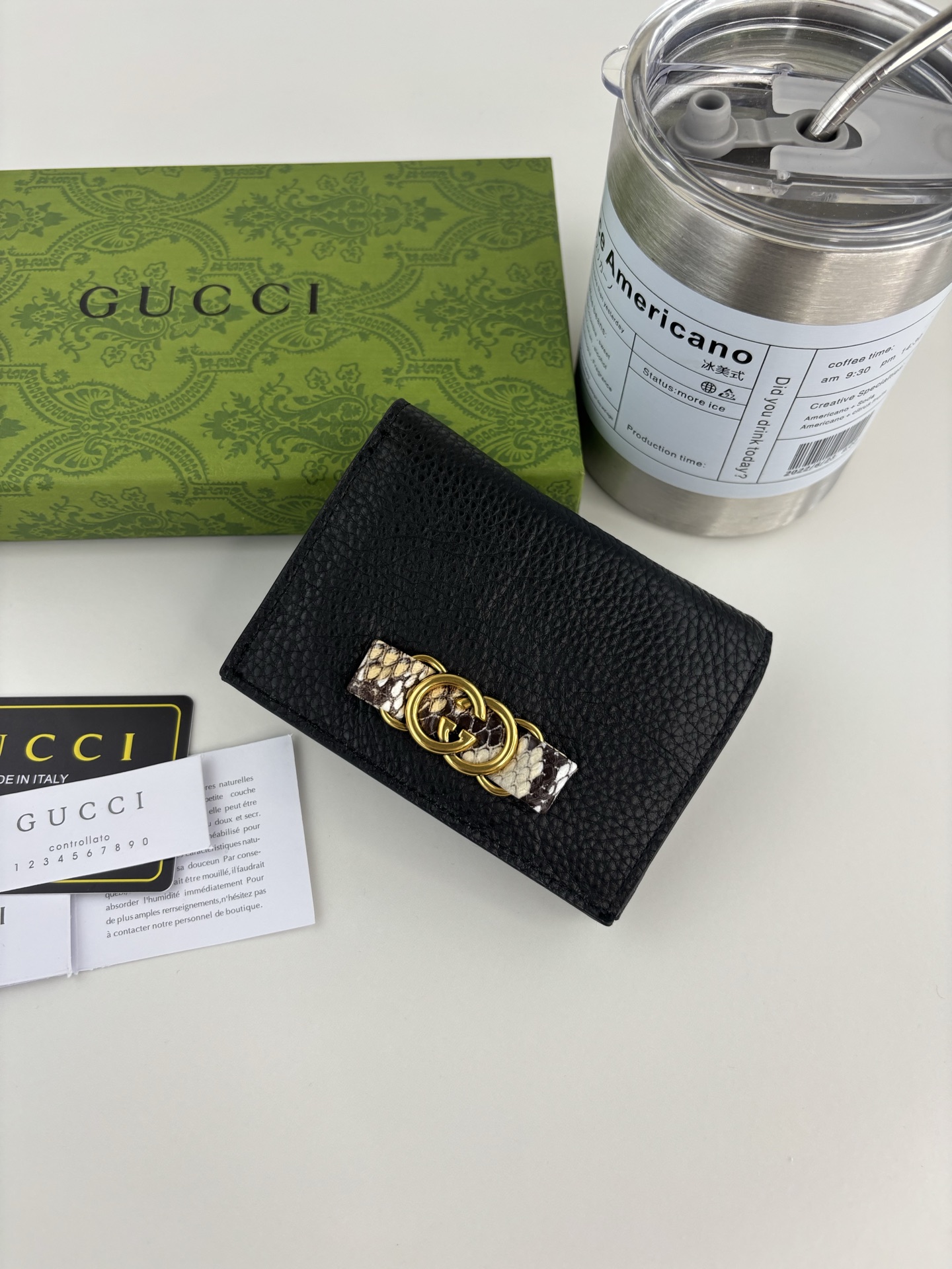 GUCCl 蟒蛇皮蝴蝶结小財布 - 双Gデザインのエレガントなアイテム