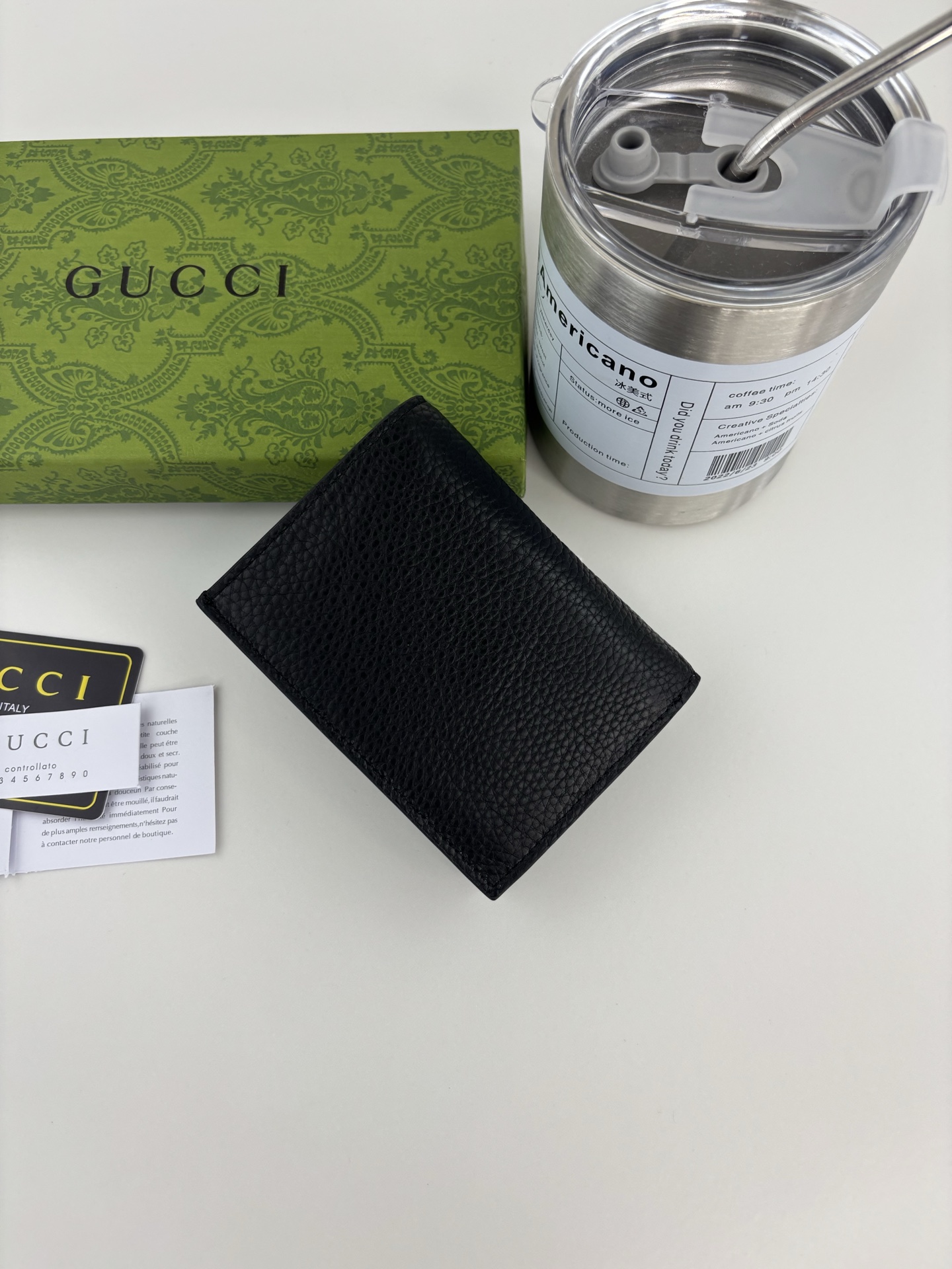 GUCCl 蟒蛇皮蝴蝶结小財布 - 双Gデザインのエレガントなアイテム