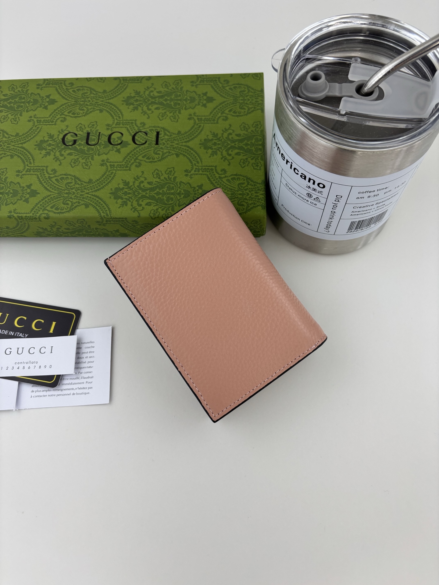 GUCCl 蟒蛇皮蝴蝶结小財布 - 上質な小牛皮と双Gデザイン