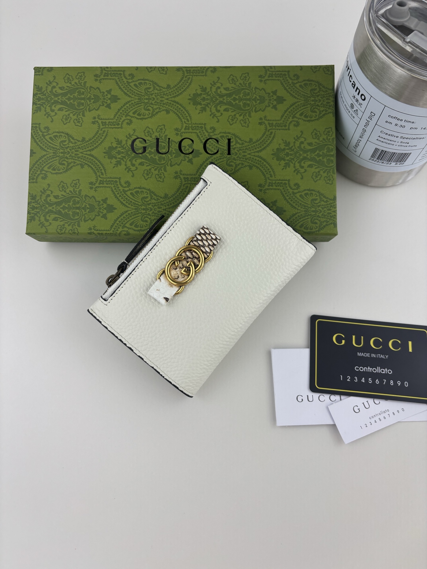 GUCCI 夏季シリーズ ホワイトレザー 財布 蝶結びデザイン
