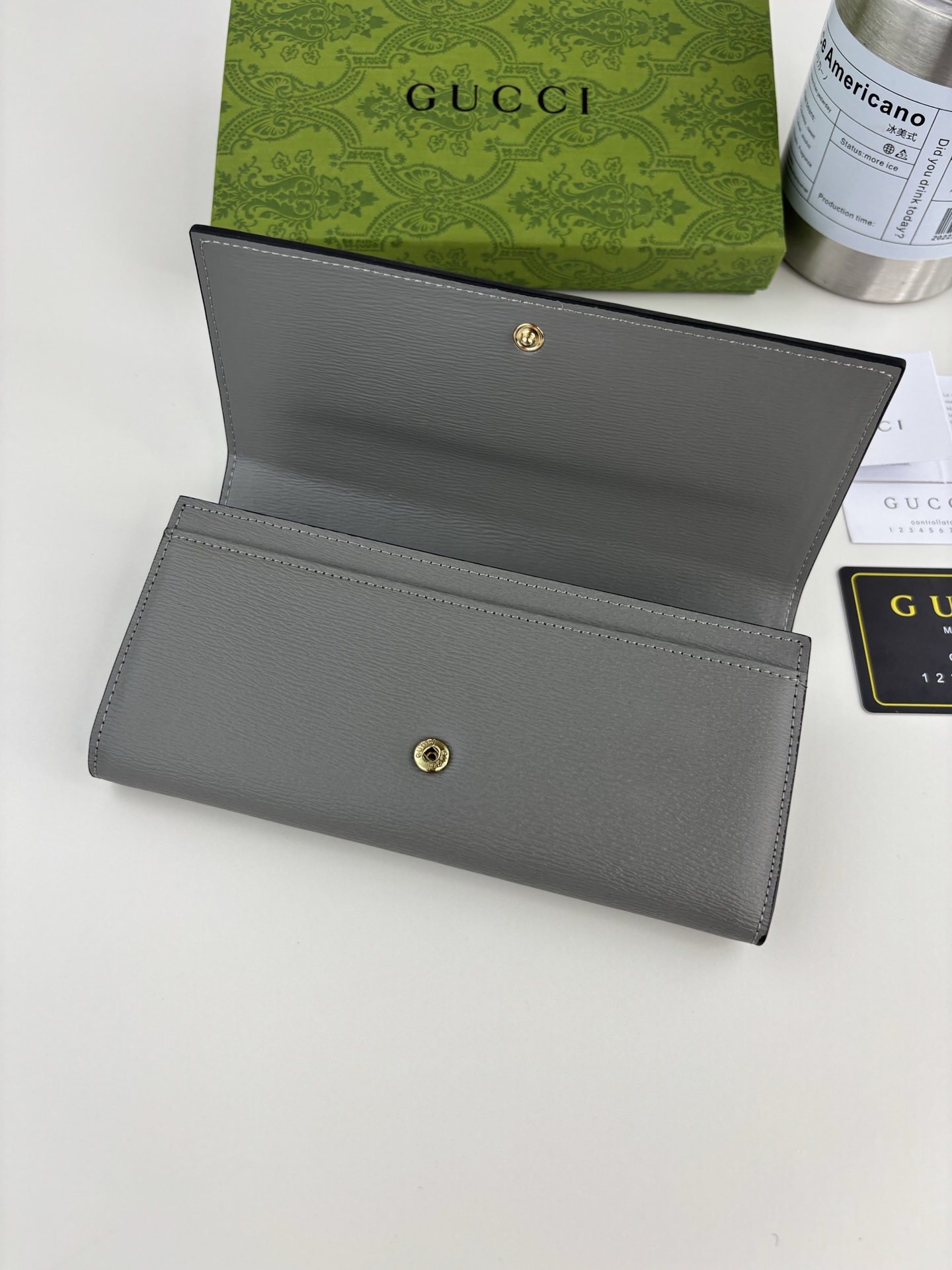 Gucci 手書きロゴ長財布 グレー皮革のエレガンス