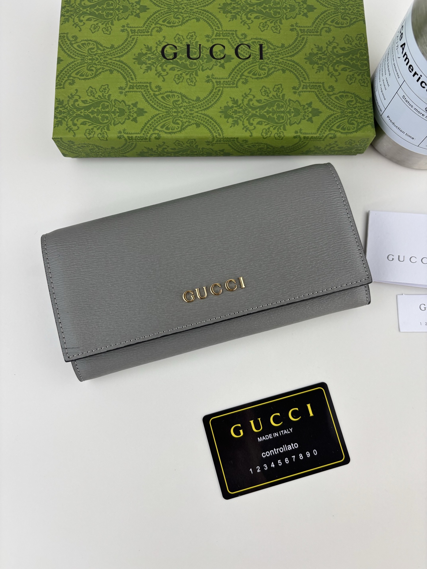 Gucci 手書きロゴ長財布 グレー皮革のエレガンス