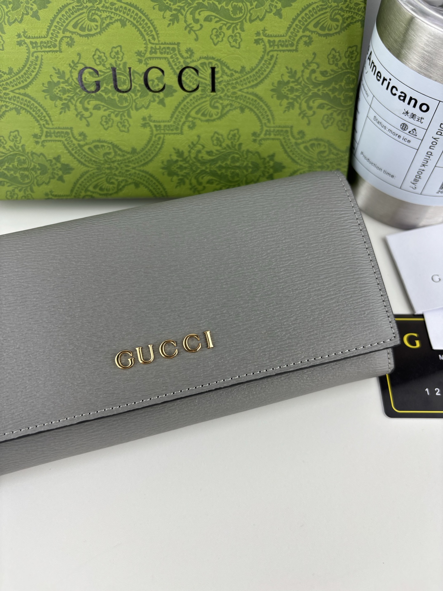 Gucci 手書きロゴ長財布 グレー皮革のエレガンス