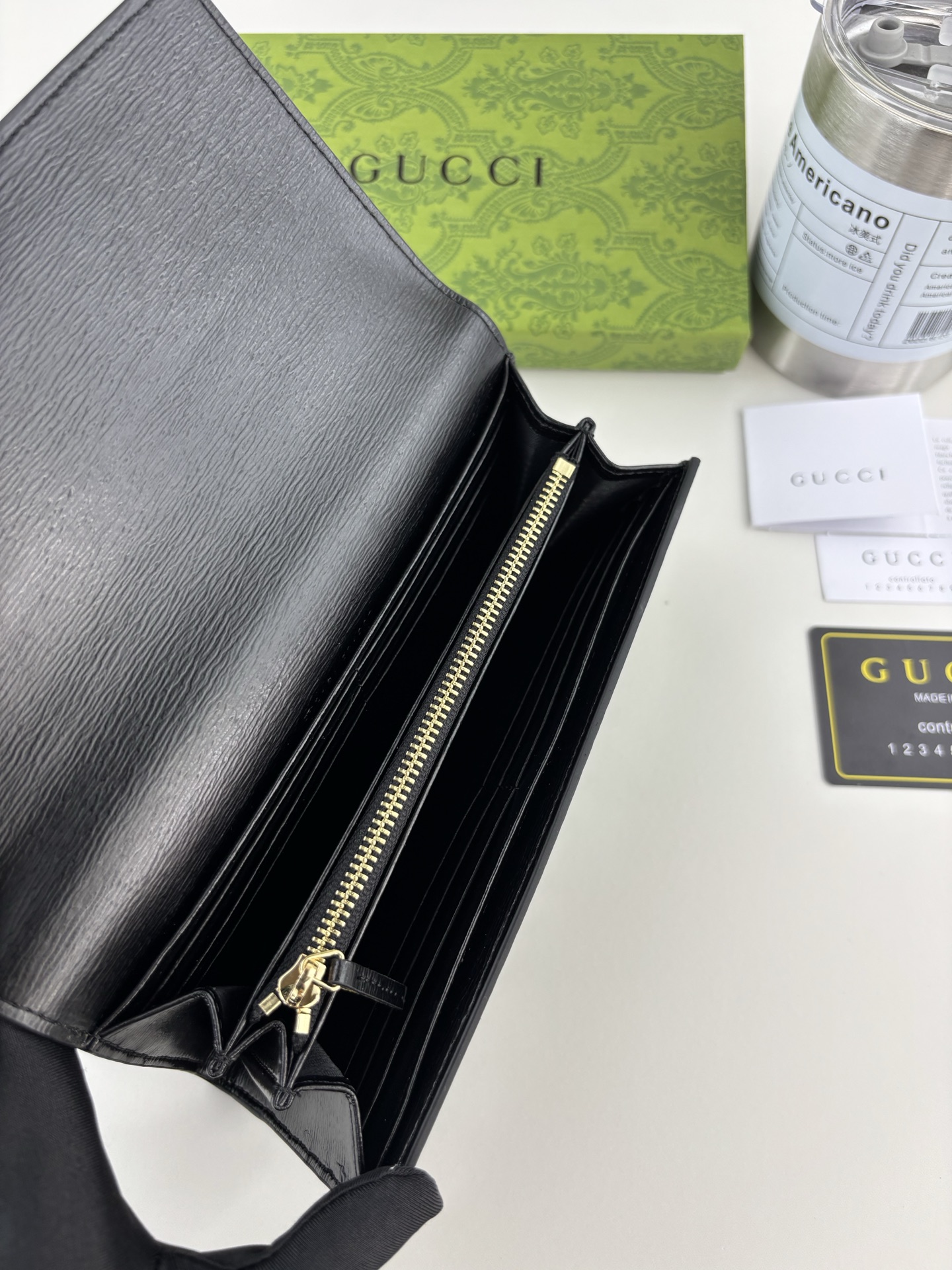 Gucci 手書きロゴ長財布 ブラックレザー