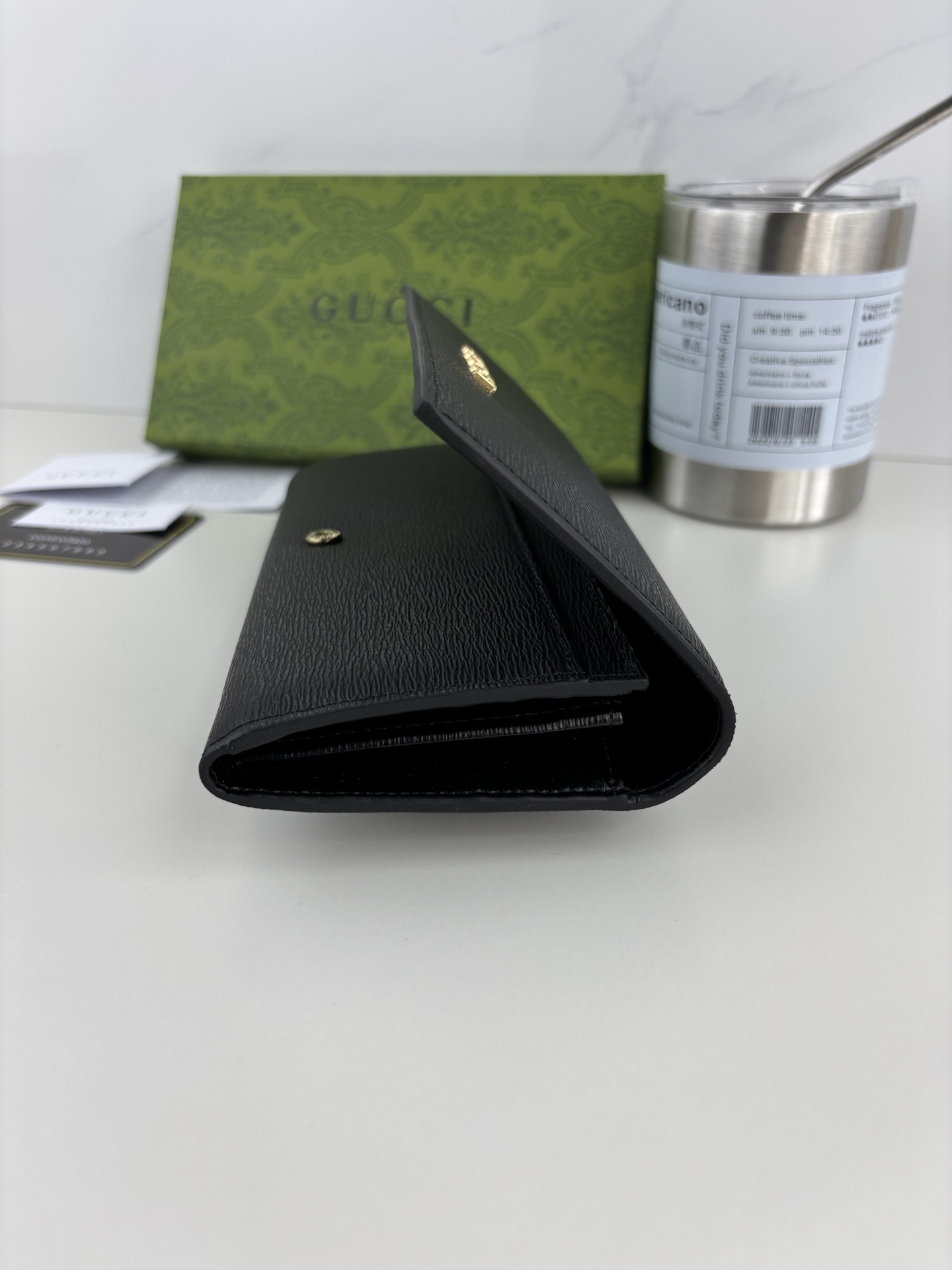 Gucci 手書きロゴ長財布 ブラックレザー