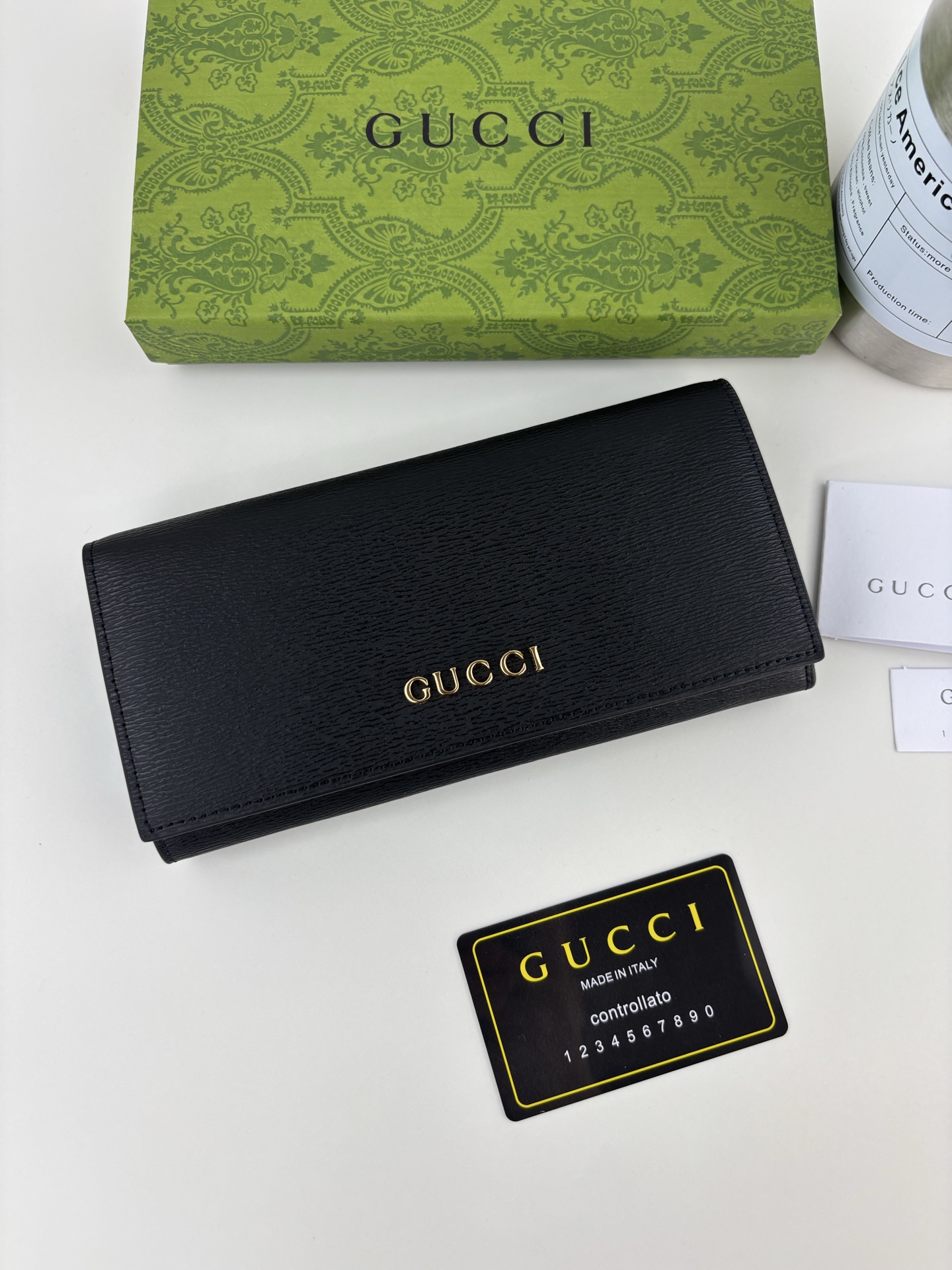 Gucci 手書きロゴ長財布 ブラックレザー