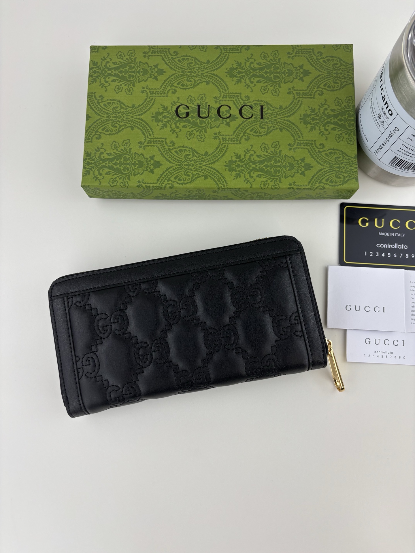 GUCCI GG Matelassé ブラック財布 - 柔らかなキルティングレザー