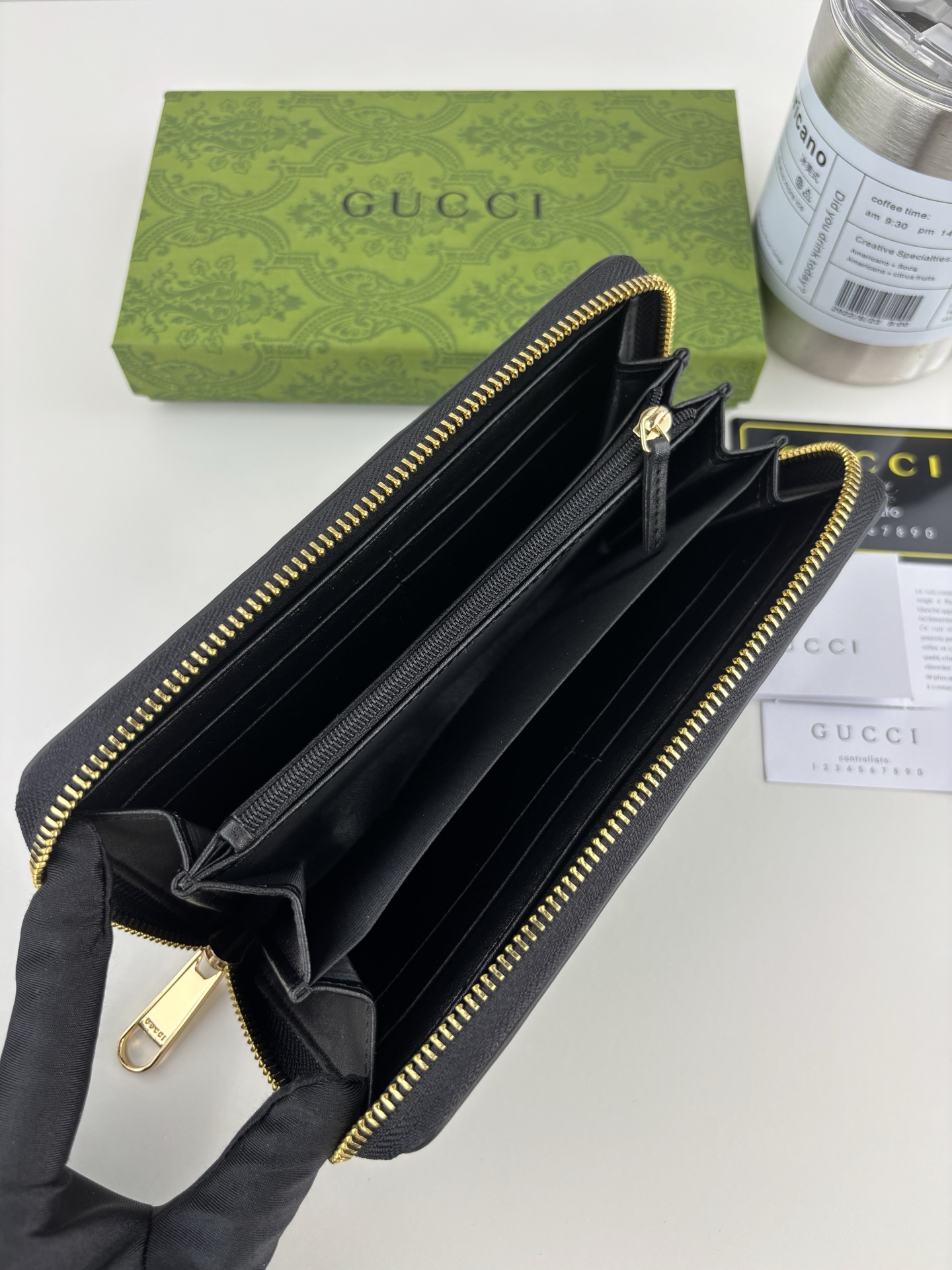 GUCCI GG Matelassé ブラック財布 - 柔らかなキルティングレザー