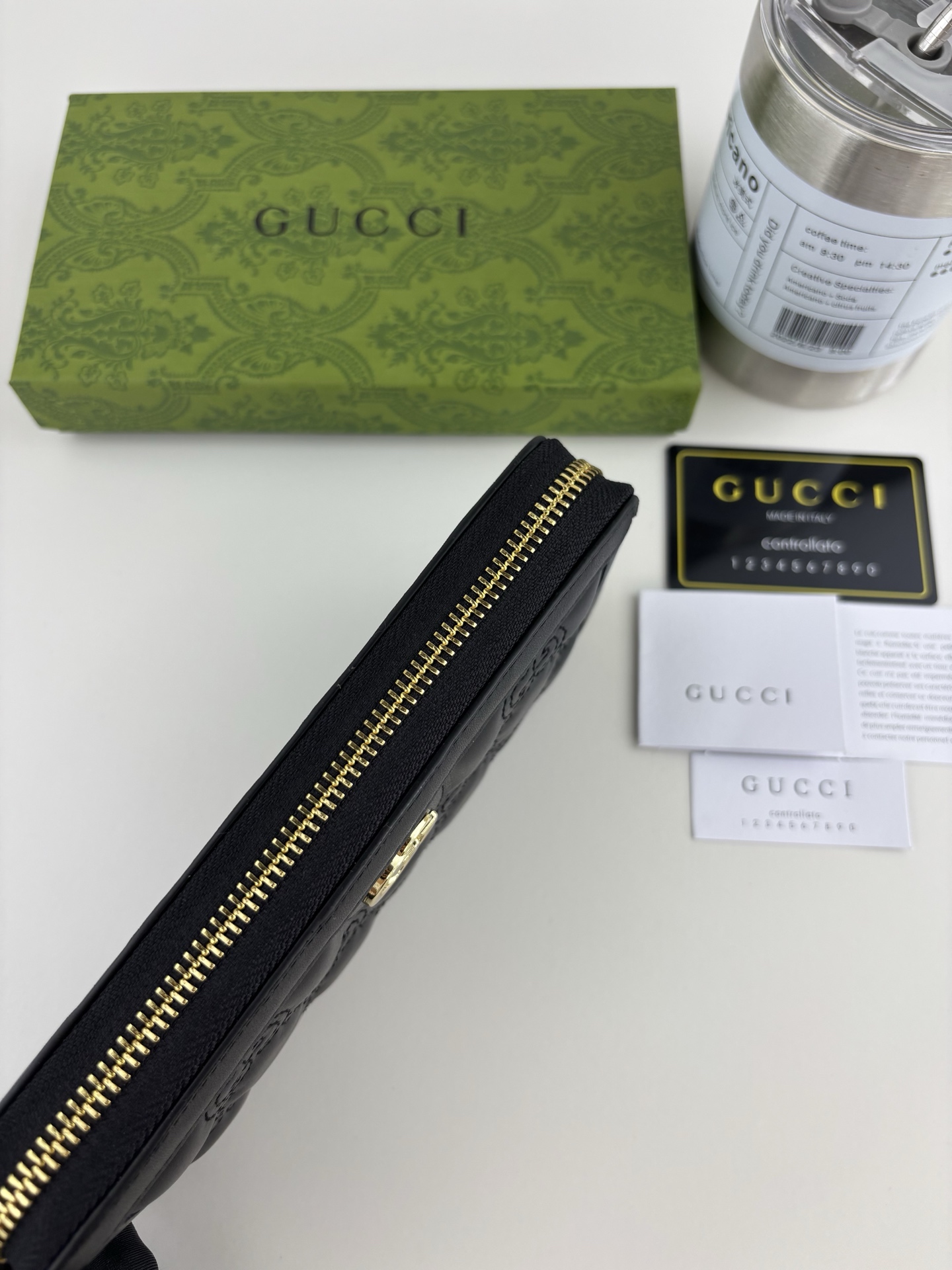 GUCCI GG Matelassé ブラック財布 - 柔らかなキルティングレザー