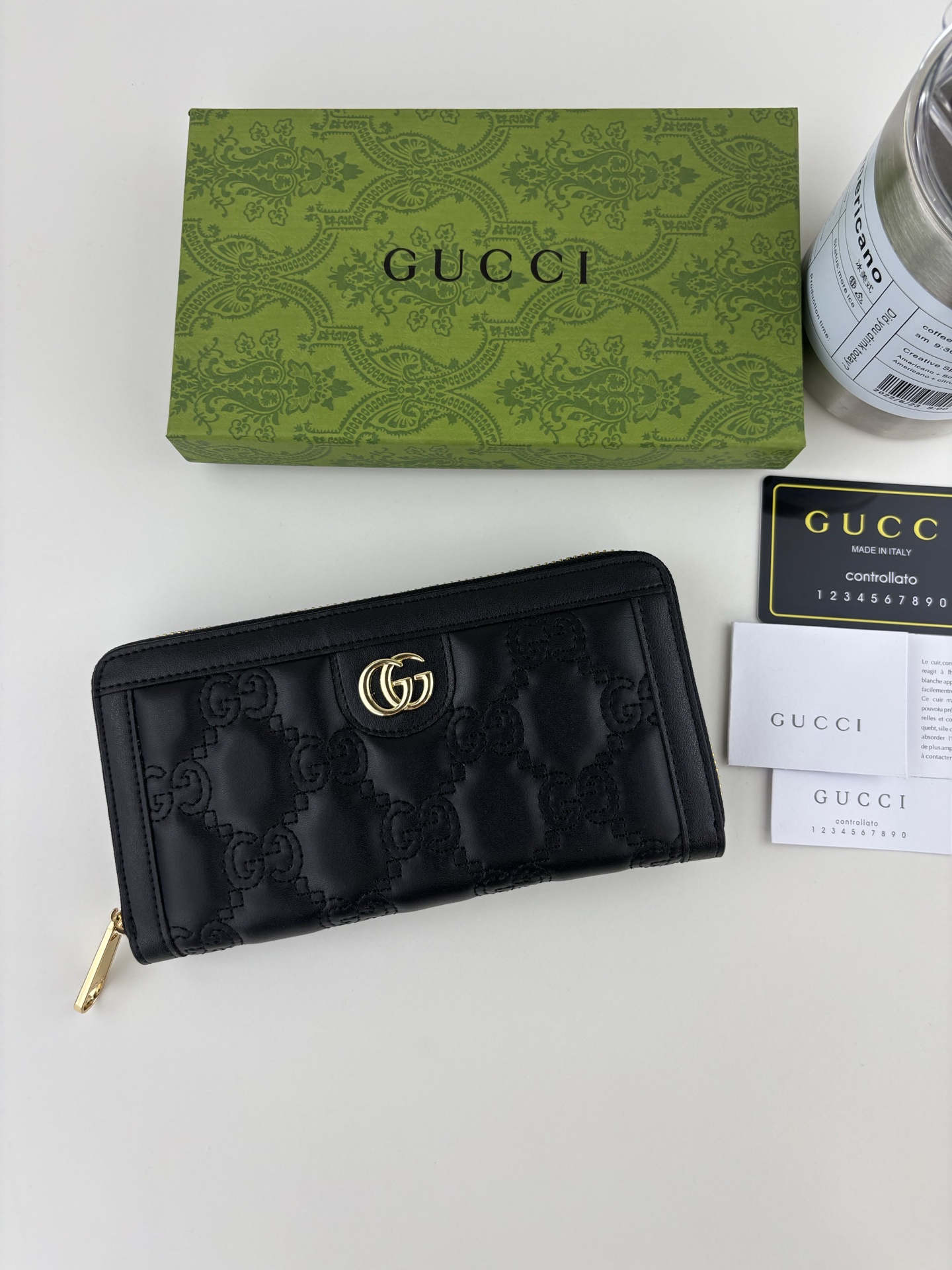 GUCCI GG Matelassé ブラック財布 - 柔らかなキルティングレザー