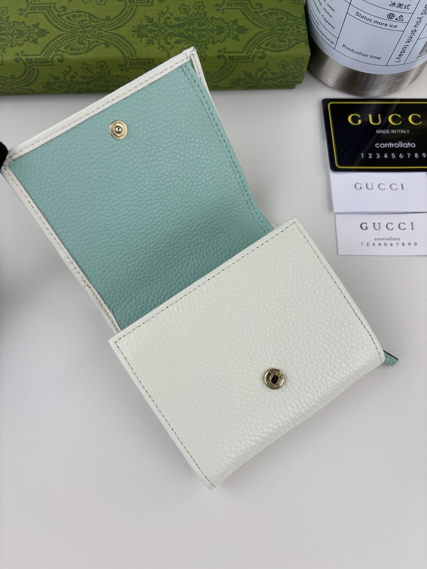 GUCCl 小型ダブルG金属装飾の白色皮革バッグ