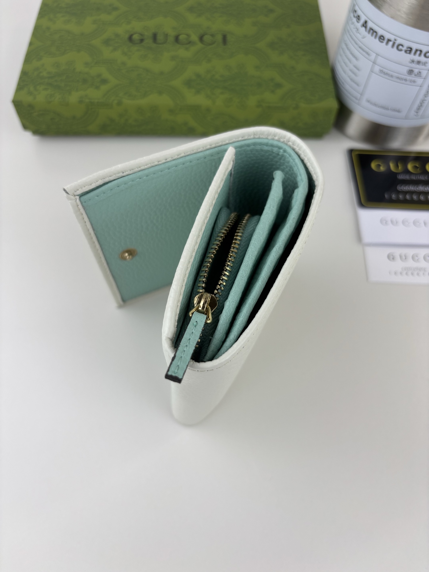 GUCCl 小型ダブルG金属装飾の白色皮革バッグ