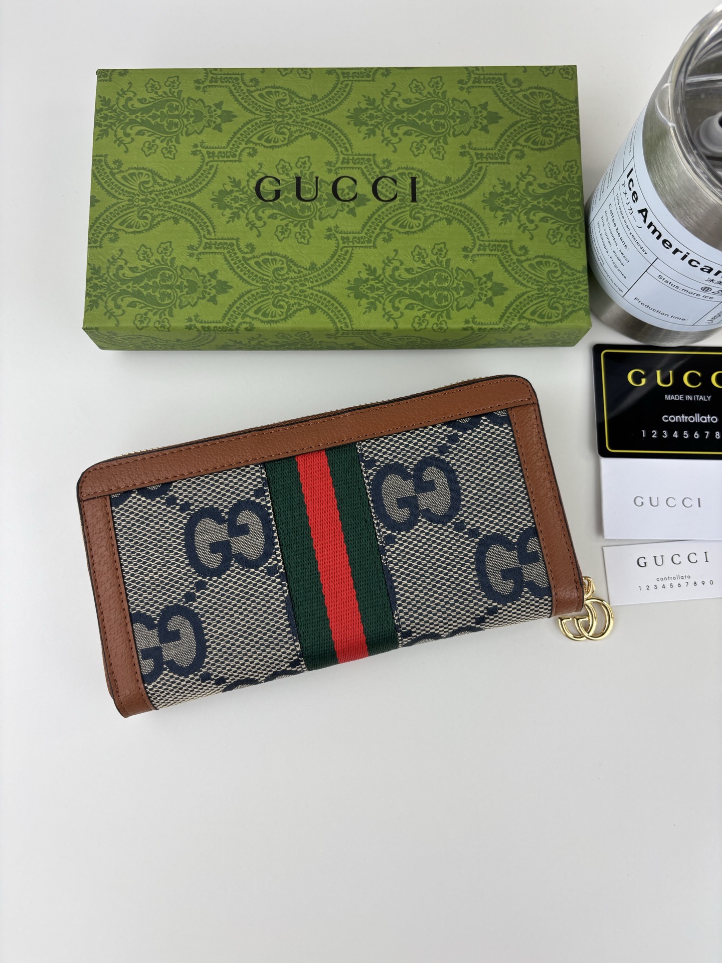 Gucci 全拉链式財布 GG Supreme デザインと機能性を兼ね備えた