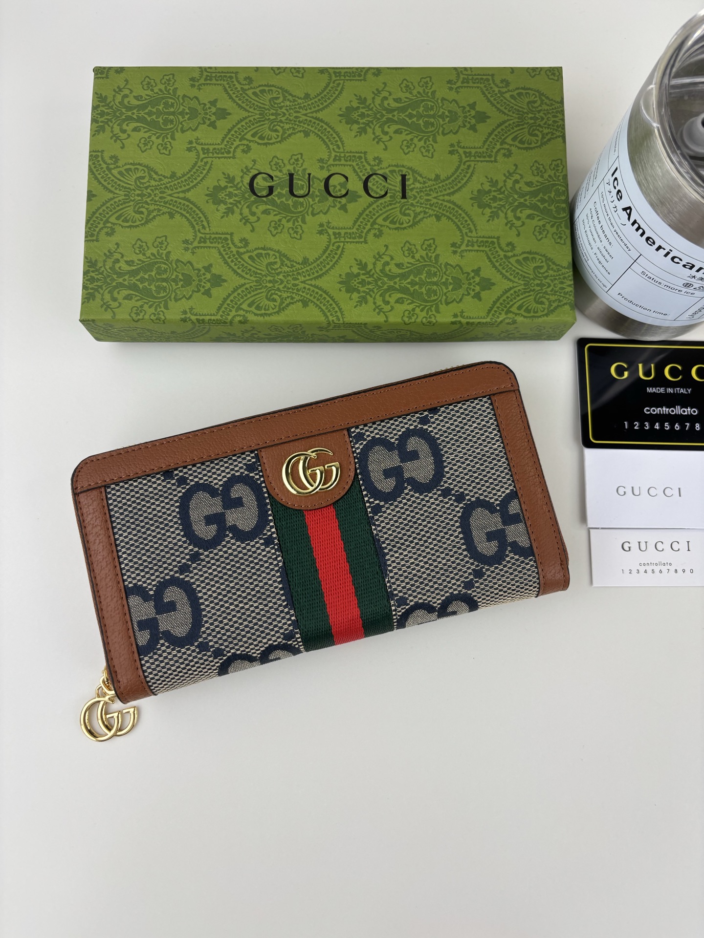 Gucci 全拉链式財布 GG Supreme デザインと機能性を兼ね備えた