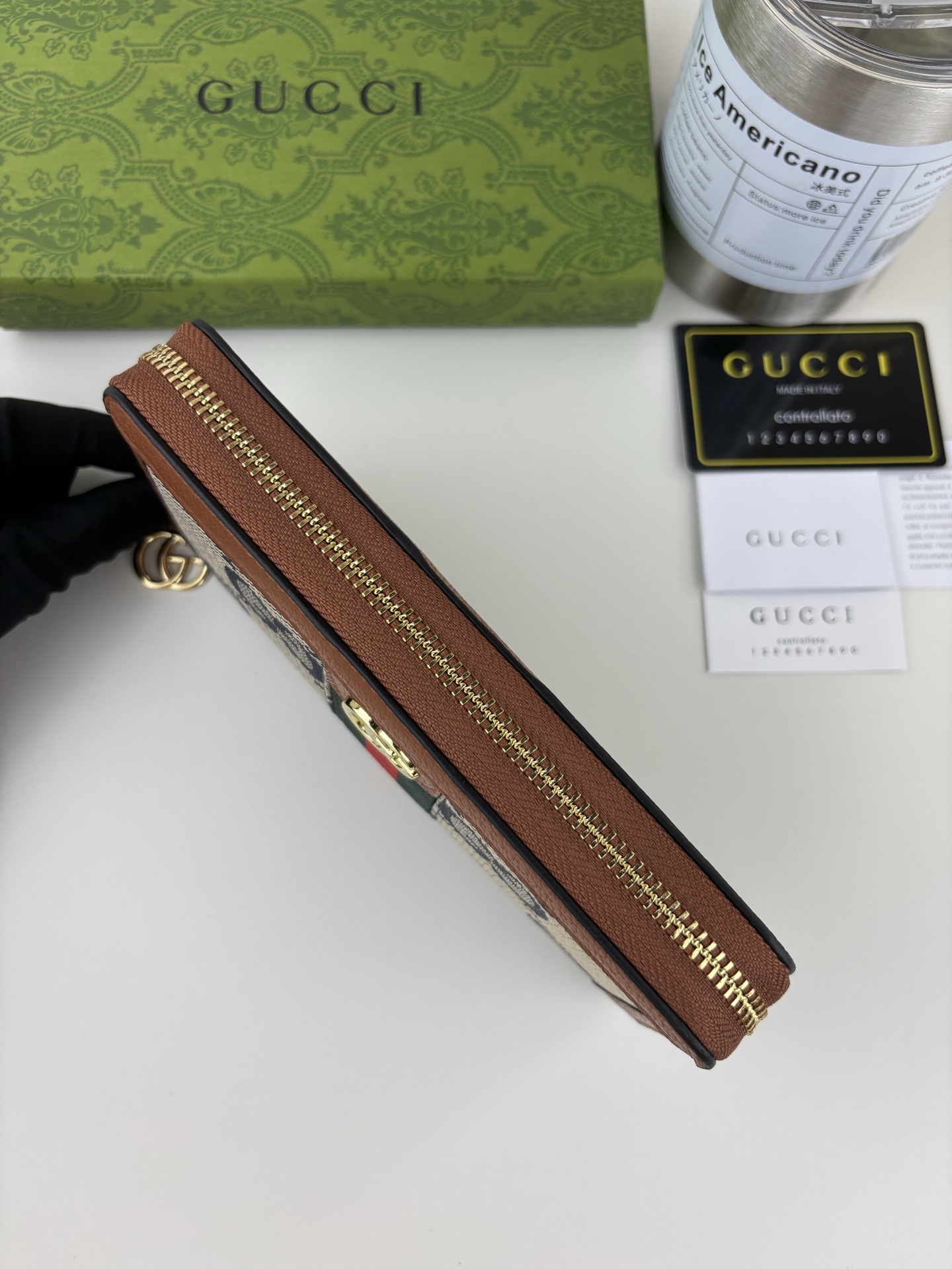 Gucci 全拉链式財布 GG Supreme デザインと機能性を兼ね備えた