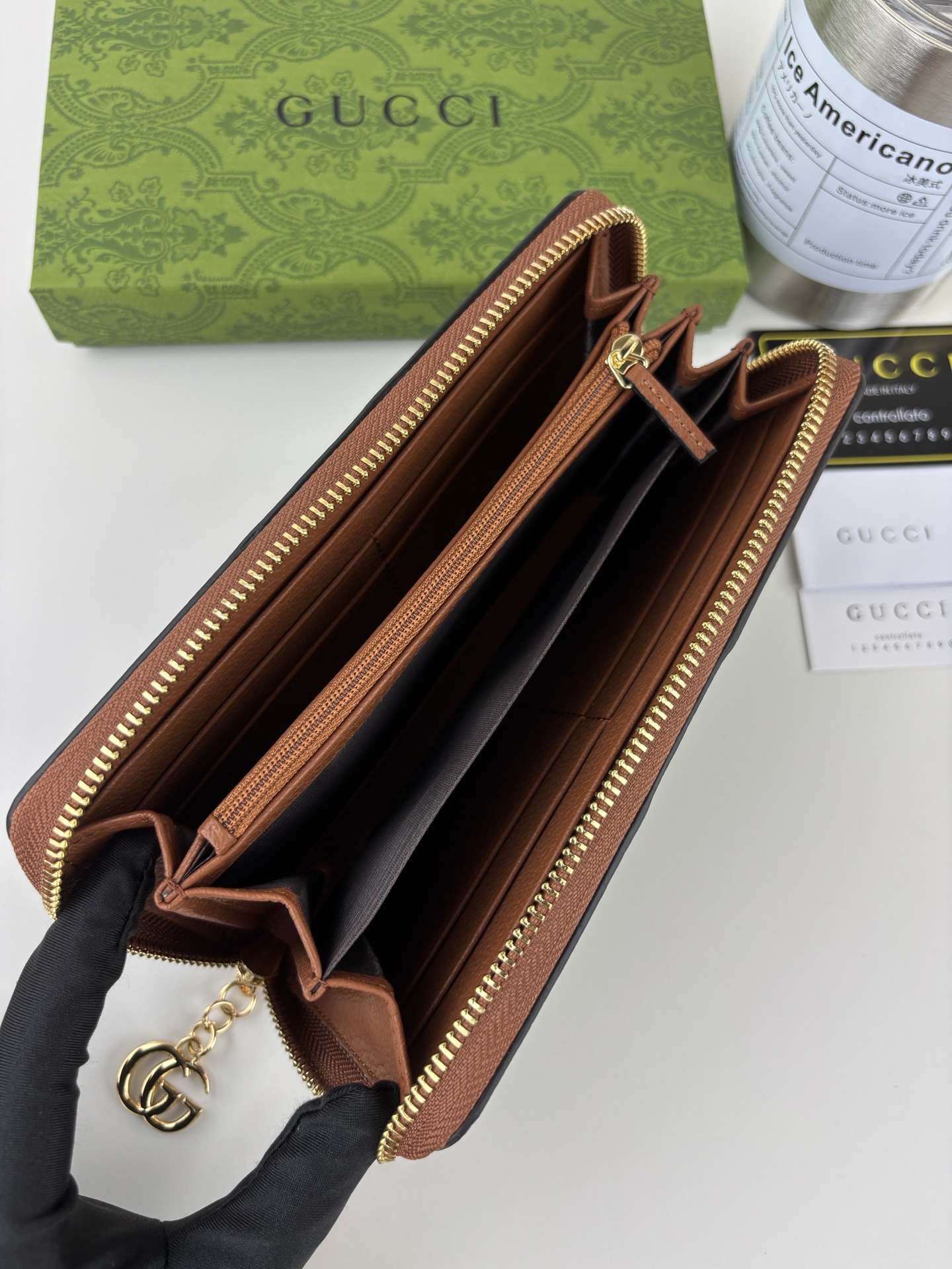 Gucci 全拉链式財布 GG Supreme デザインと機能性を兼ね備えた