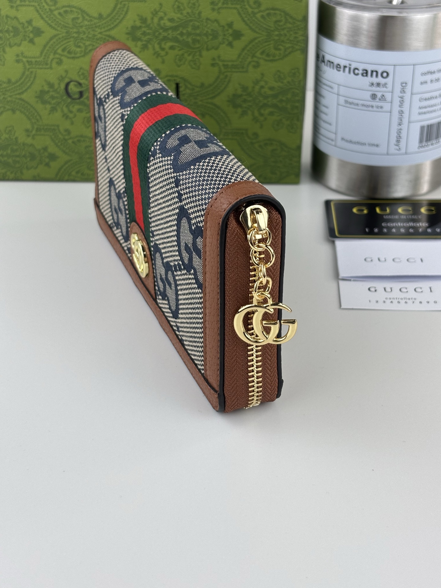 Gucci 全拉链式財布 GG Supreme デザインと機能性を兼ね備えた