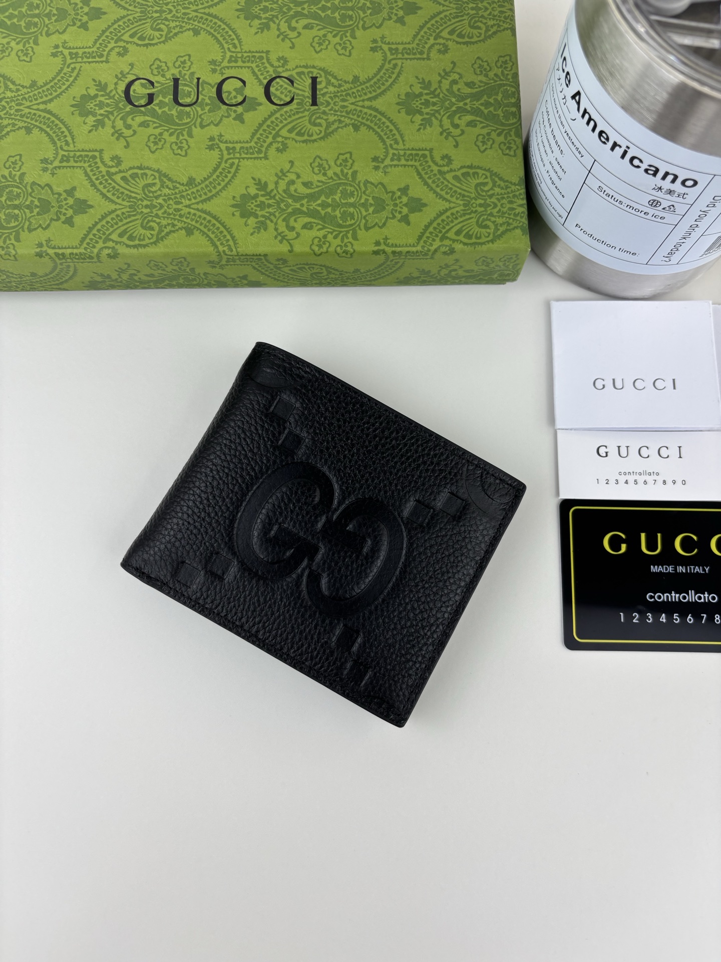 Gucci GG印花財布 - 鮮やかなグリーンレザーで個性を演出