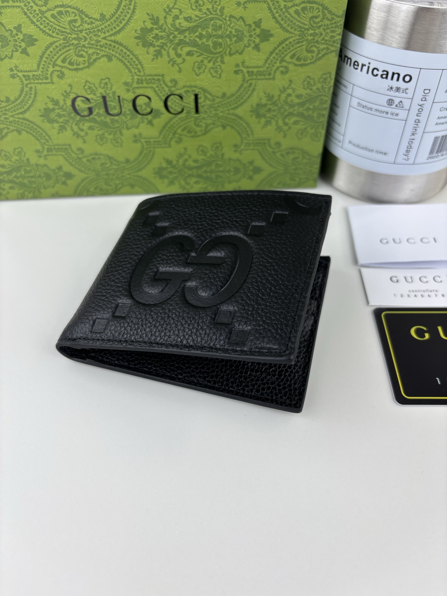 Gucci GG印花財布 - 鮮やかなグリーンレザーで個性を演出