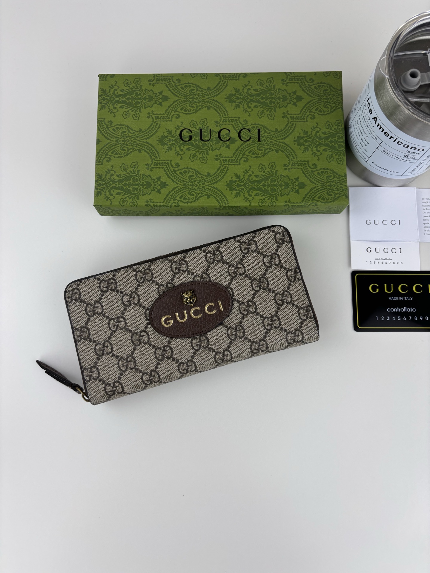 GUCCl 杏色GG Supreme PVCラウンドジッパー財布 虎頭デザイン
