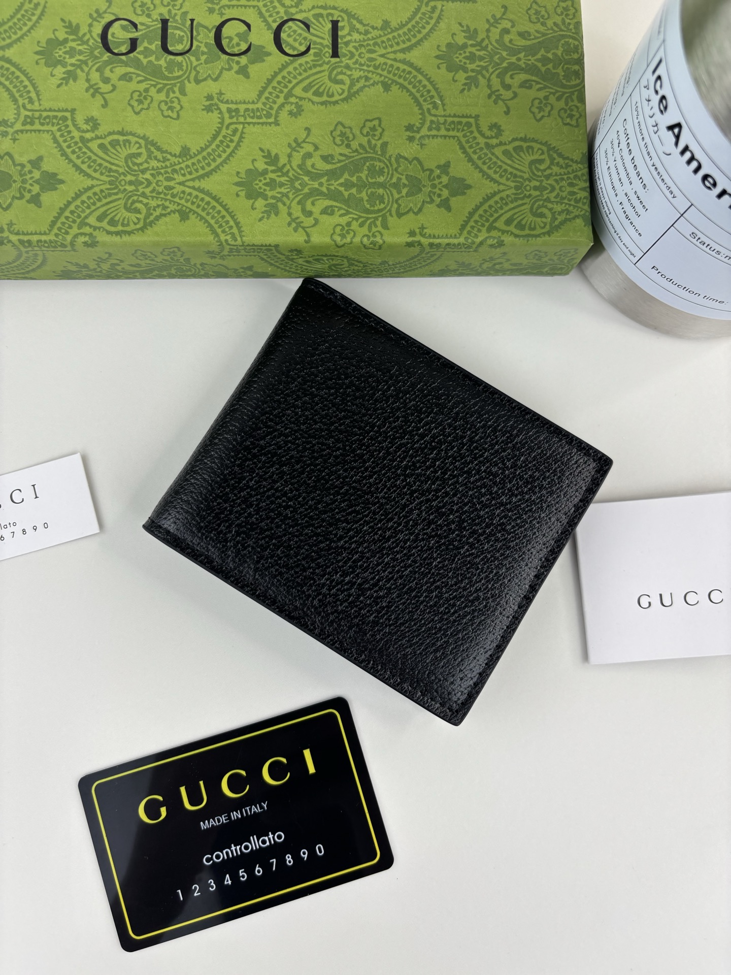 GUCCl animalier短皮夹 - 黒色・スタイリッシュな必需品