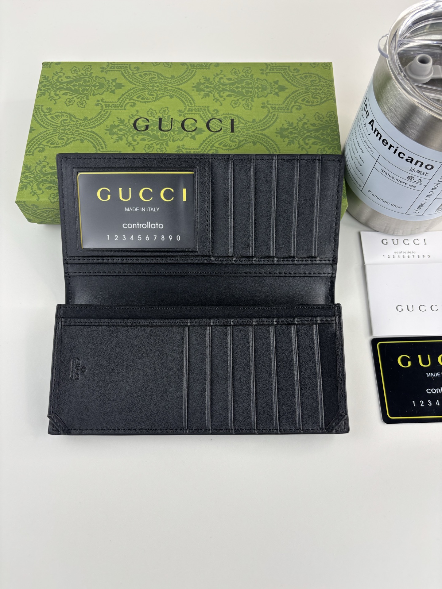 GUCCl 新款男士长夹钱包，实物实拍！原版牛皮～采用热压精致印花，触感厚实，时尚大方，低调奢华。 款号:   尺寸: 
